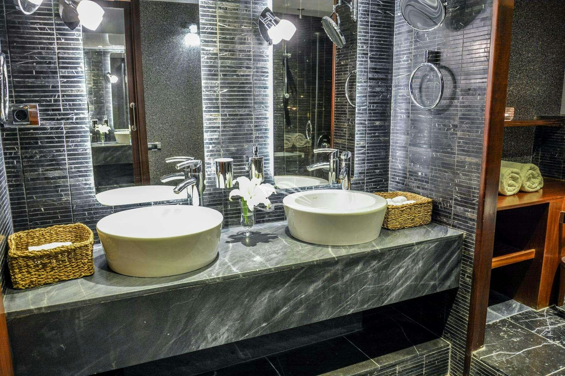 a bathroom with two sinks aboard PAPA JOE Yacht for Charter