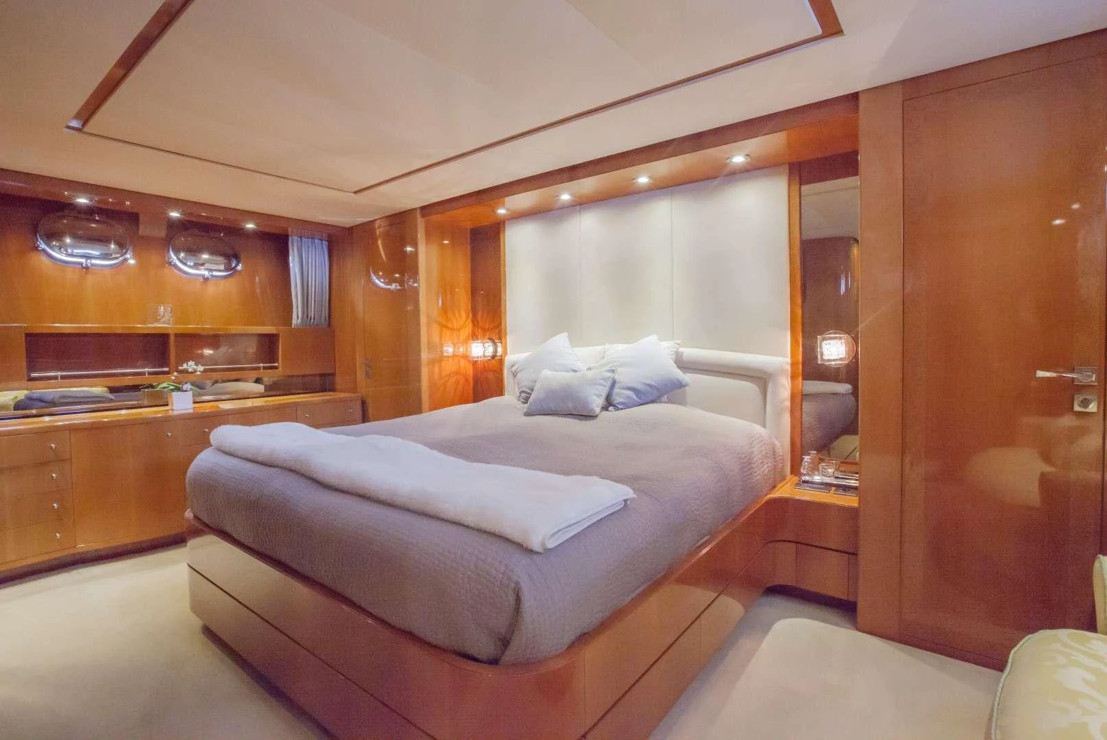 a bed in a room aboard SOLAL Yacht for Charter