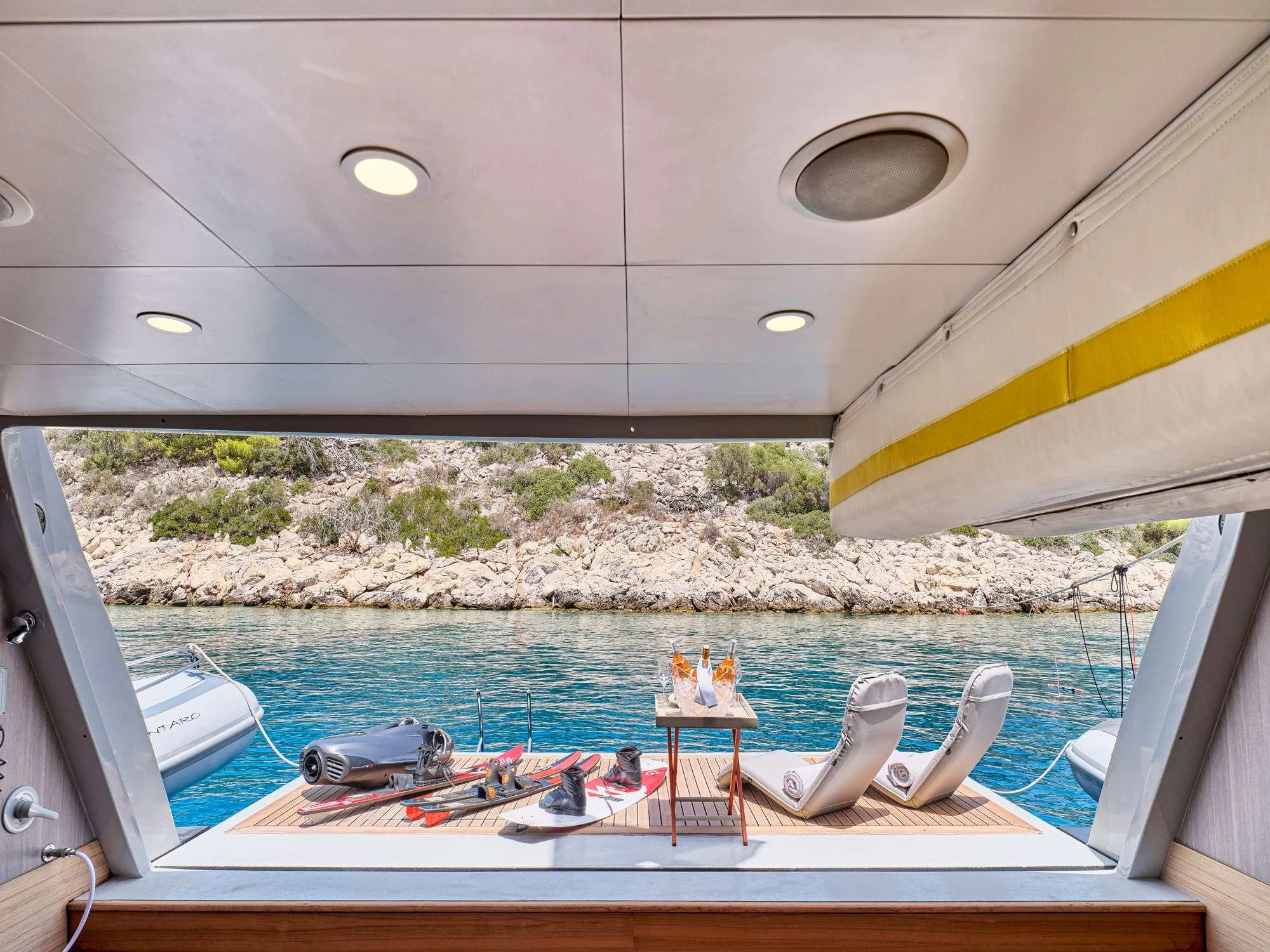 a boat with a bird statue aboard KINTARO Yacht for Charter
