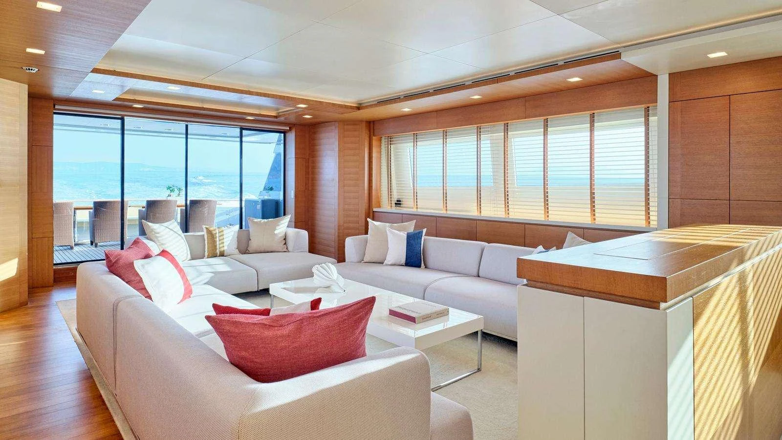 a room with a couch and a table aboard KINTARO Yacht for Charter