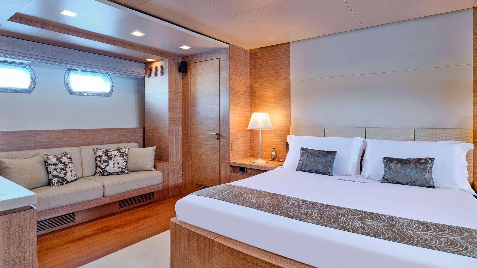 a bed in a room aboard KINTARO Yacht for Charter