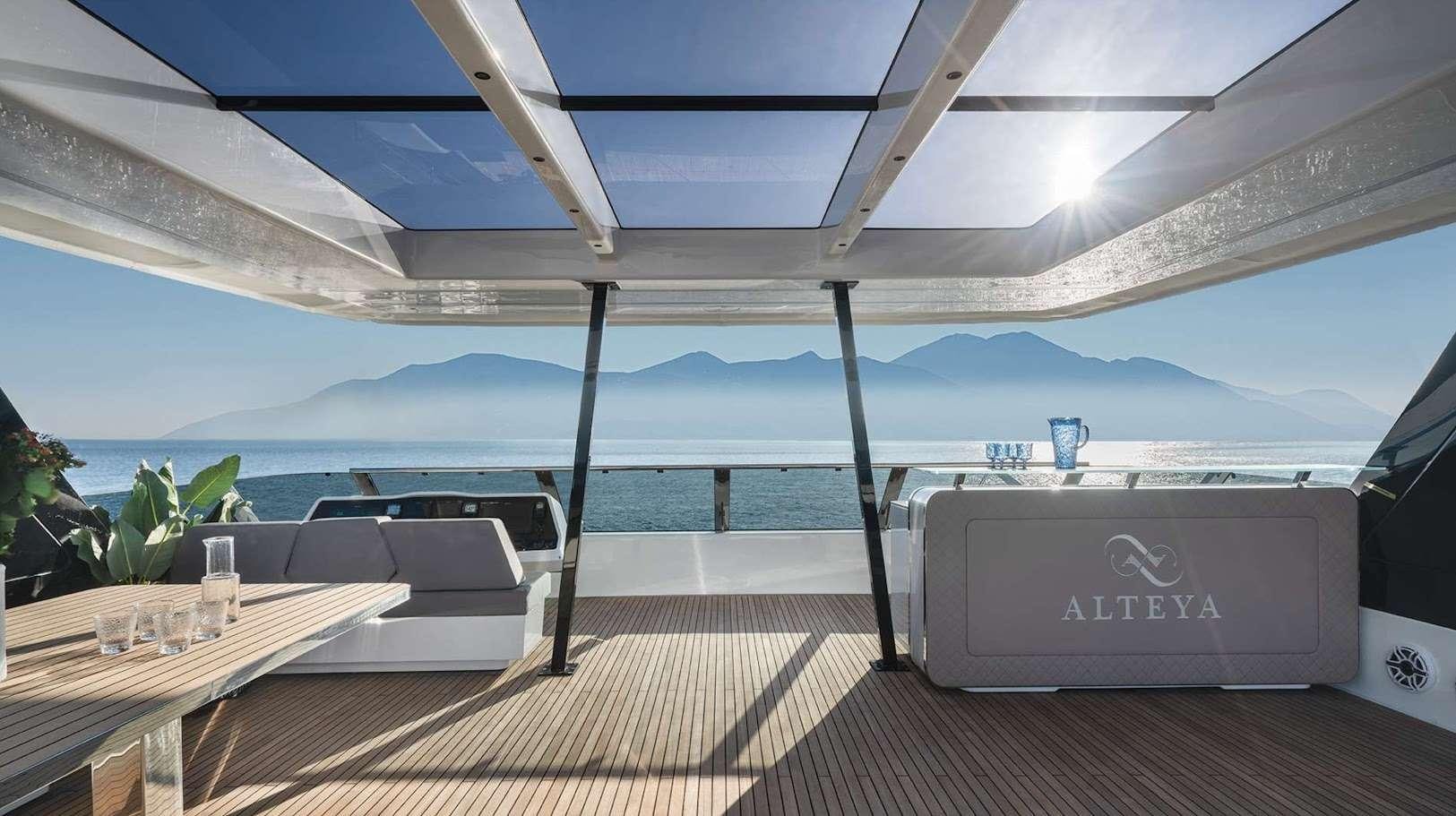 a lounge chair under a covered patio aboard ALTEYA Yacht for Charter