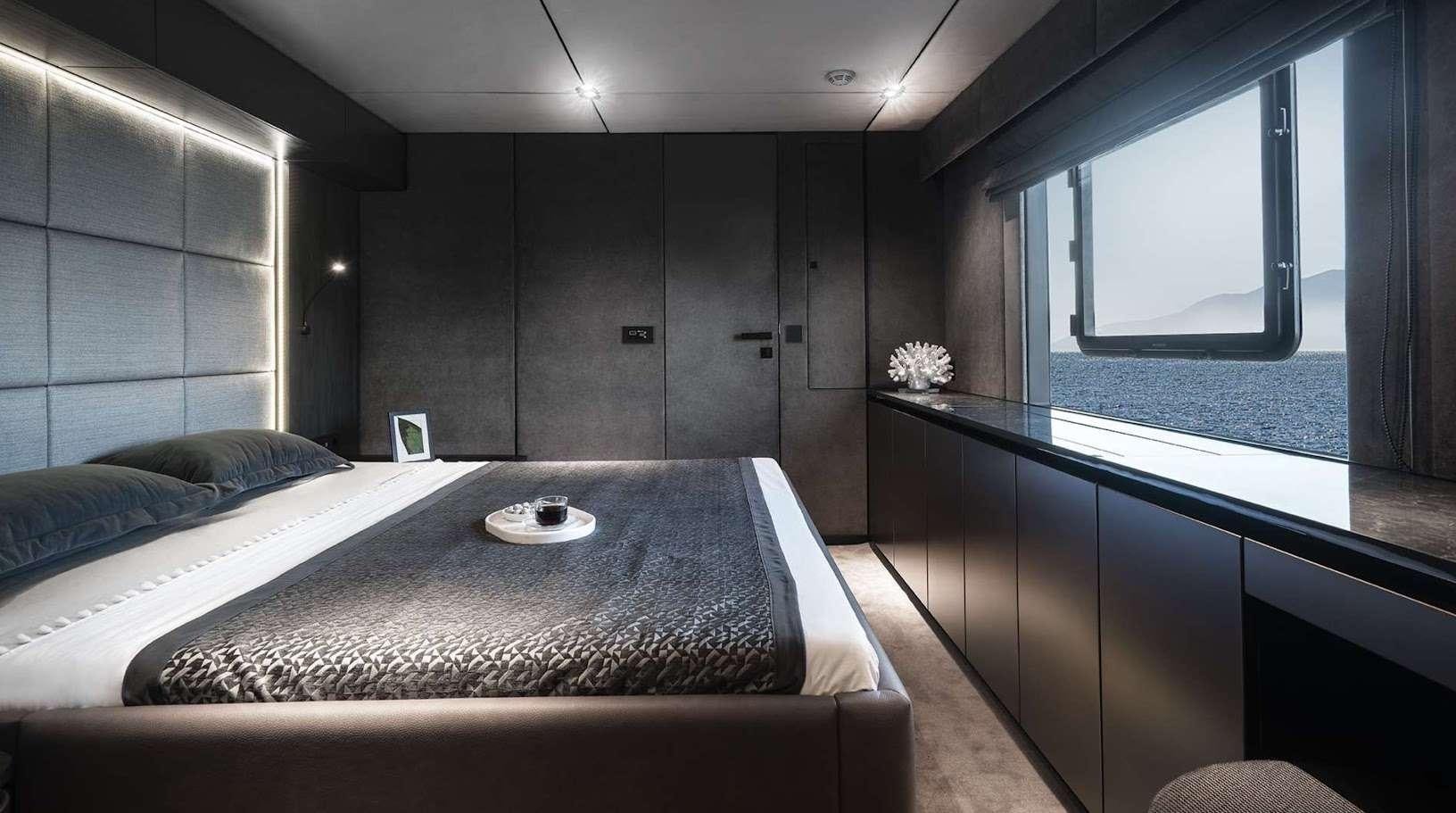 a bed in a room aboard ALTEYA Yacht for Charter