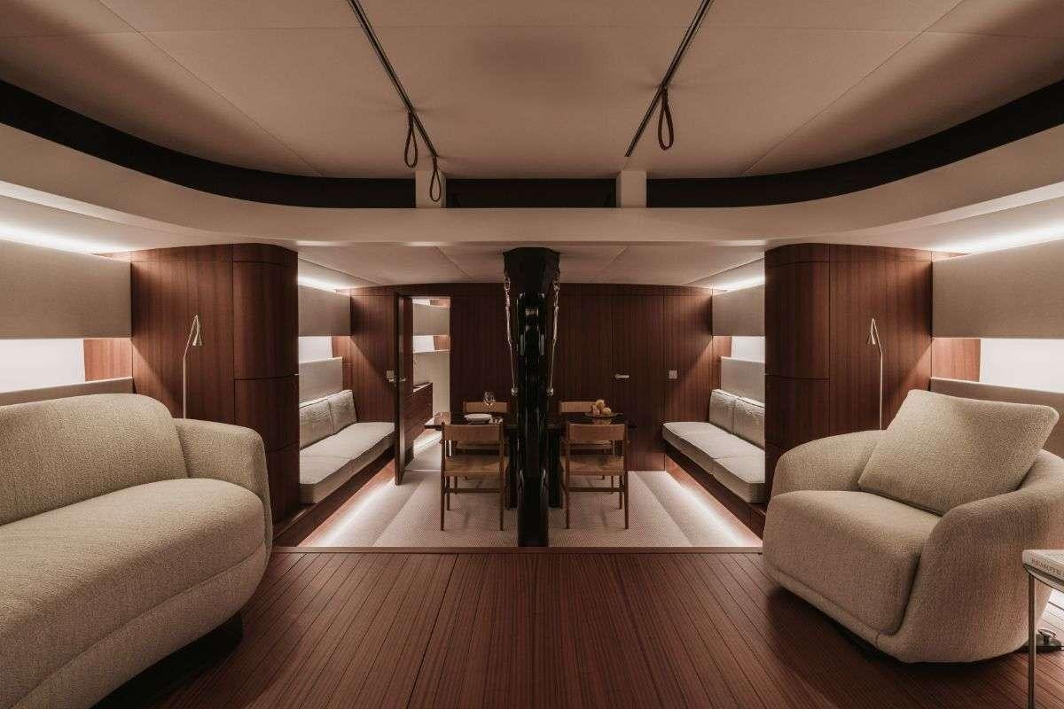 a living room with a fireplace aboard CALABASH Yacht for Charter