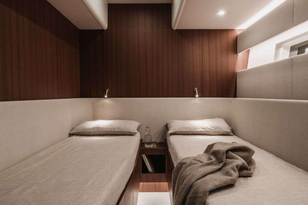 a room with two beds aboard CALABASH Yacht for Charter