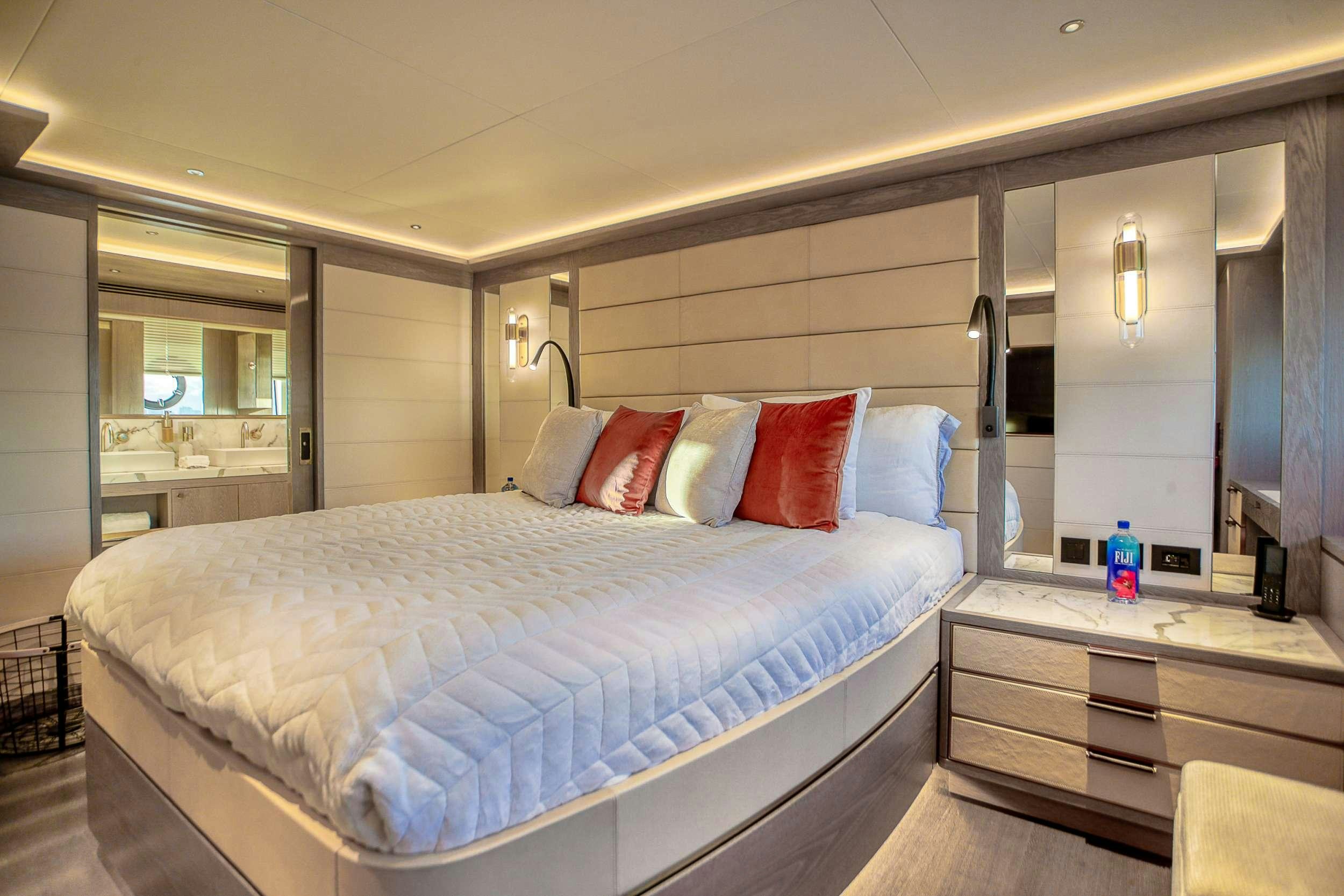 a bed in a room aboard SAINT Yacht for Charter