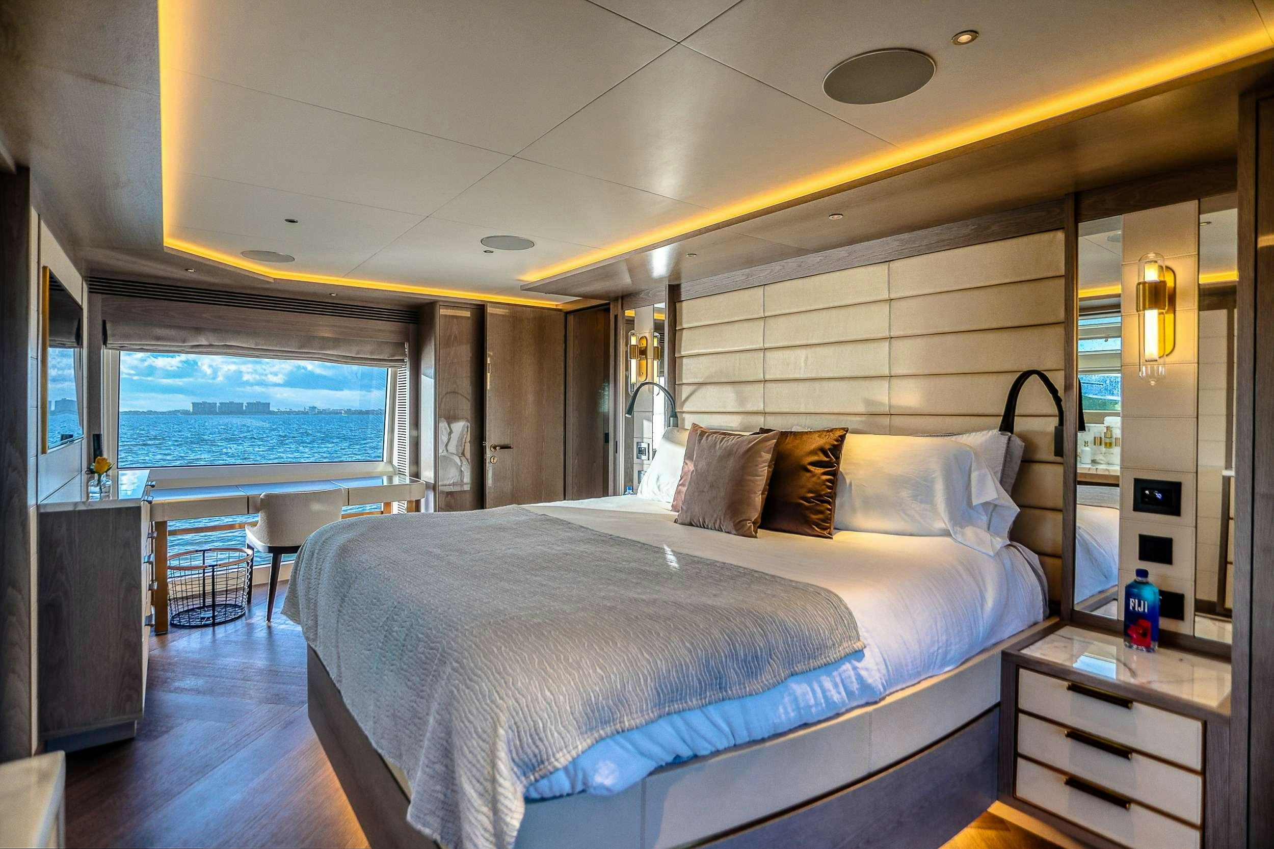 a bed in a room aboard SAINT Yacht for Charter