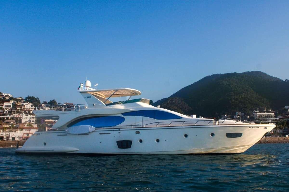a white yacht in the water aboard EL GABO Yacht for Charter