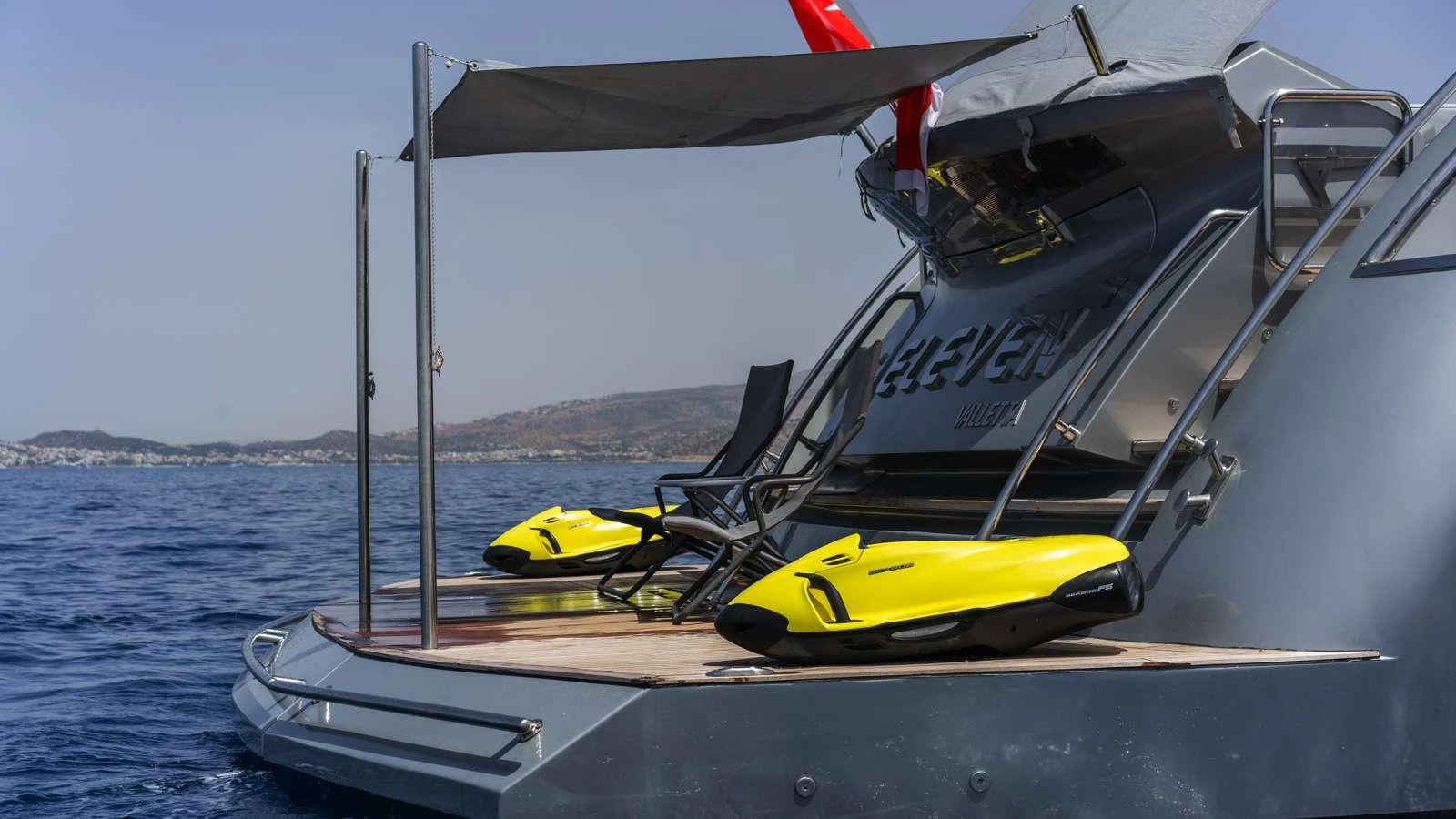 a boat with a yellow life jacket on it aboard ELEVEN I Yacht for Charter