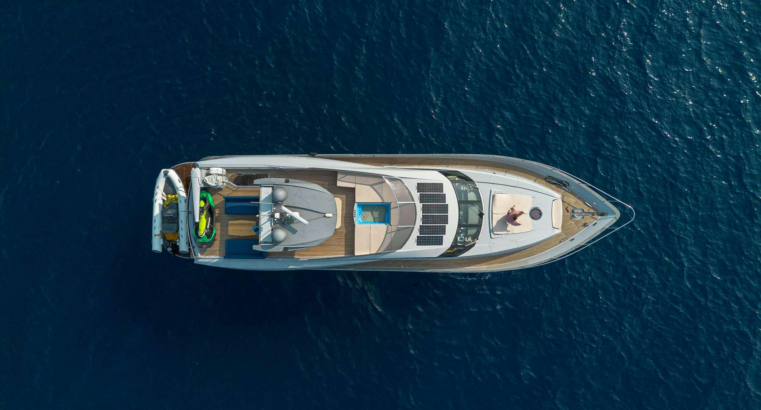 a small boat on the water aboard STELA 117 Yacht for Charter