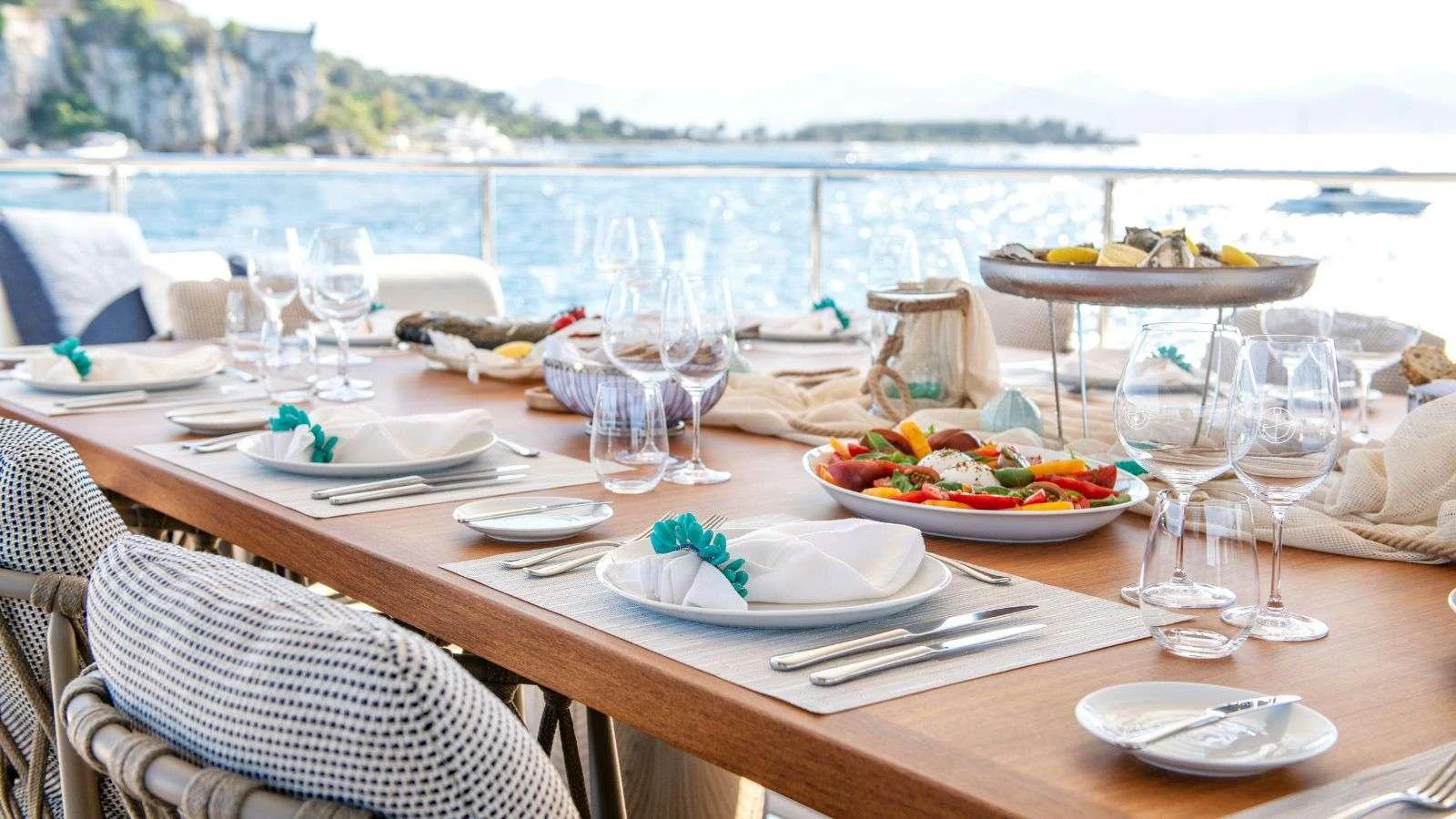 a table set for a dinner party aboard NORTHERN ESCAPE Yacht for Charter