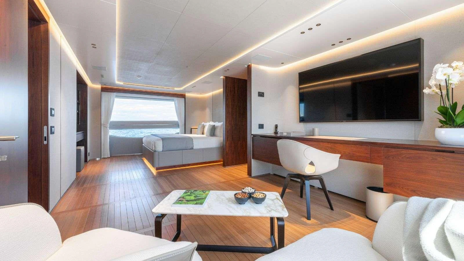a living room with a table and chairs aboard NORTHERN ESCAPE Yacht for Charter