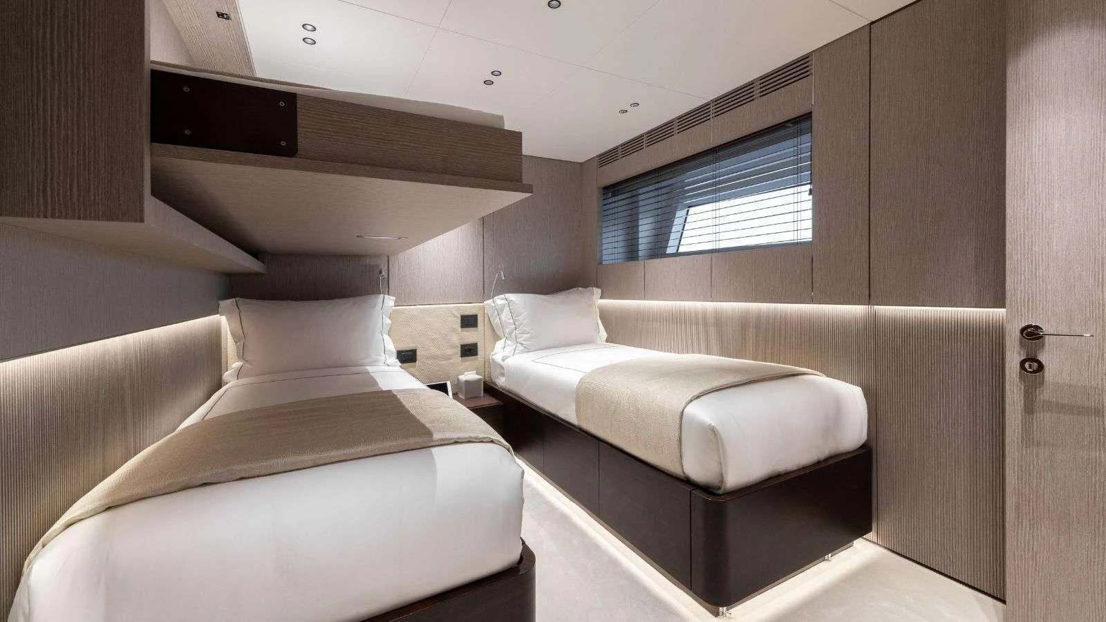 a room with two beds aboard NORTHERN ESCAPE Yacht for Charter