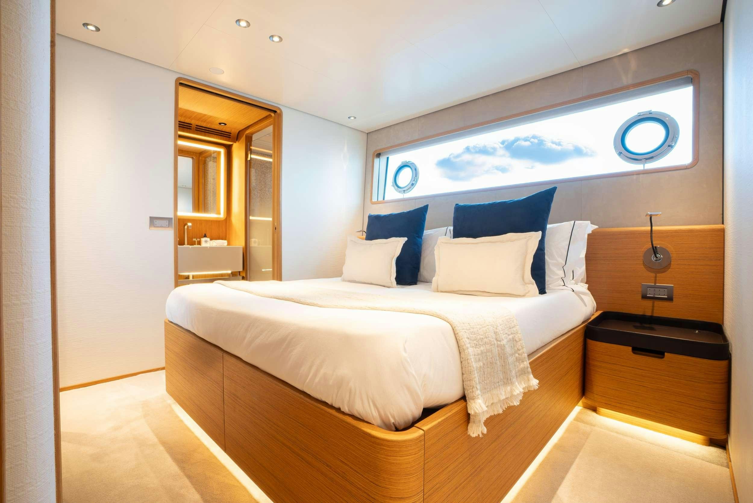 a bed in a room aboard RARE GEM Yacht for Charter