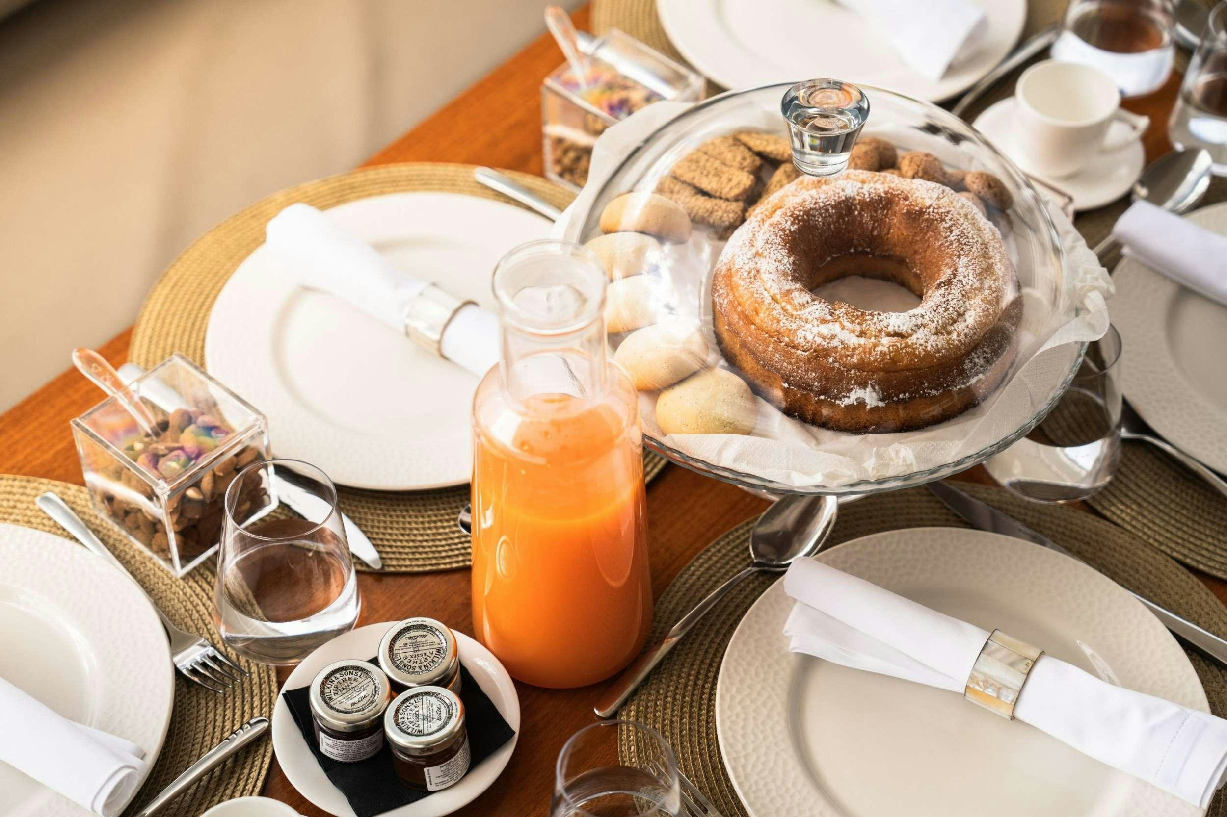 a table is filled with food aboard SEA SONS Yacht for Charter