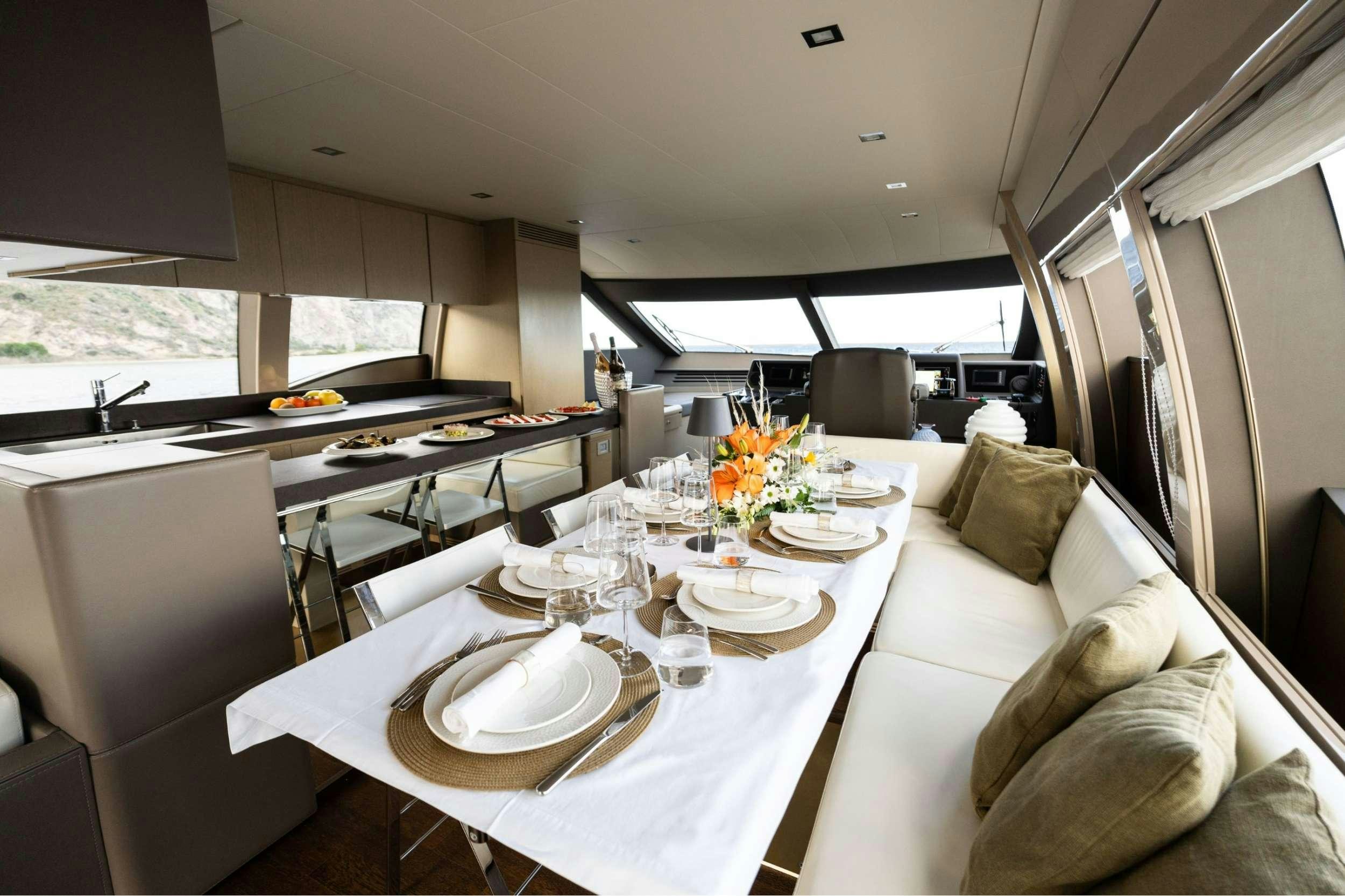 a large dining room with a large table and chairs aboard SEA SONS Yacht for Charter