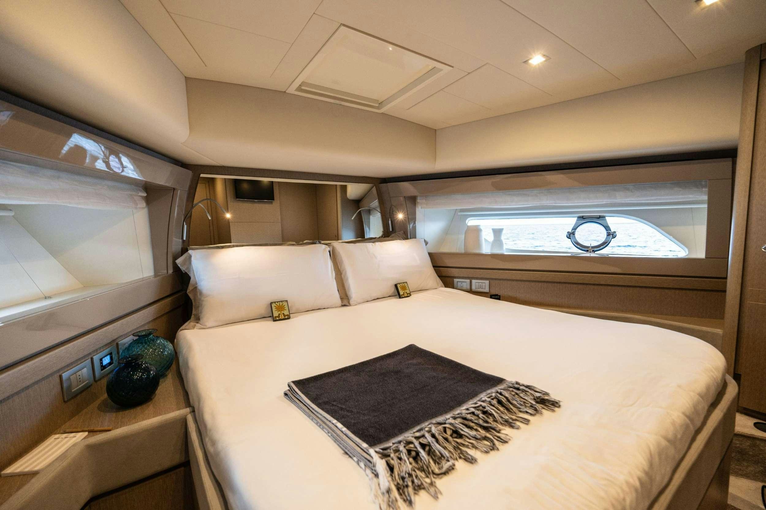 a bed in a room aboard SEA SONS Yacht for Charter
