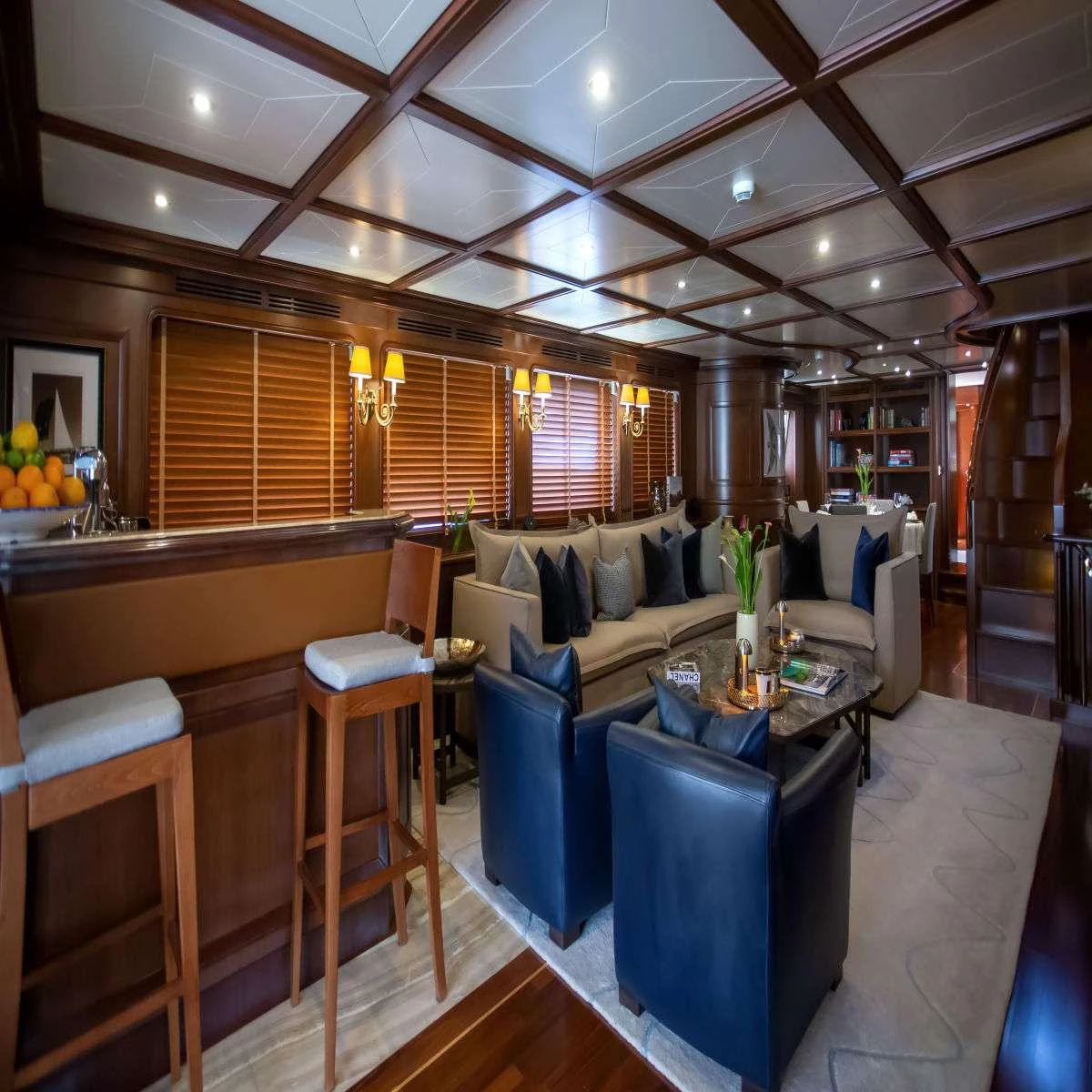a room with a couch and a table aboard HAG Yacht for Charter