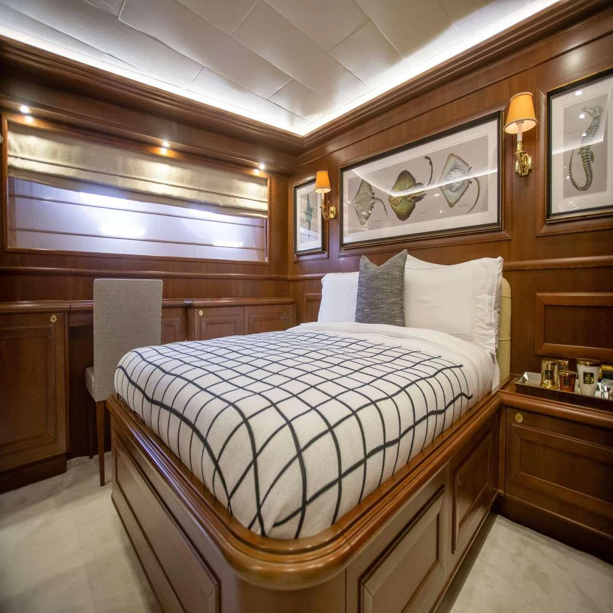 a bed in a room aboard HAG Yacht for Charter