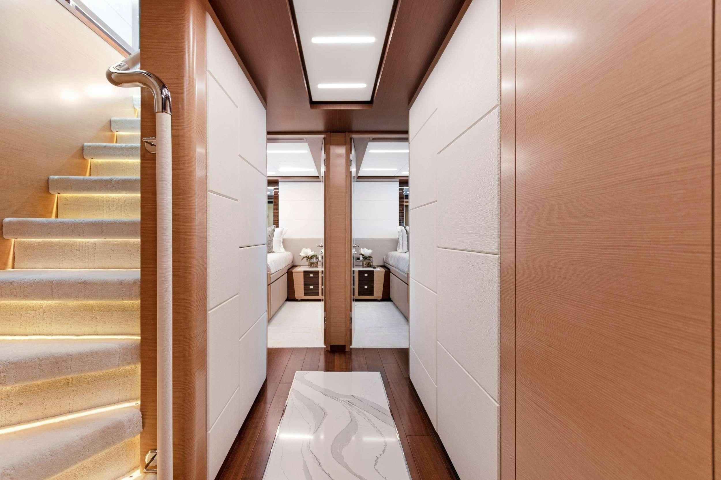 a bathroom with a long hallway aboard MAKE BIG HAPPEN Yacht for Charter