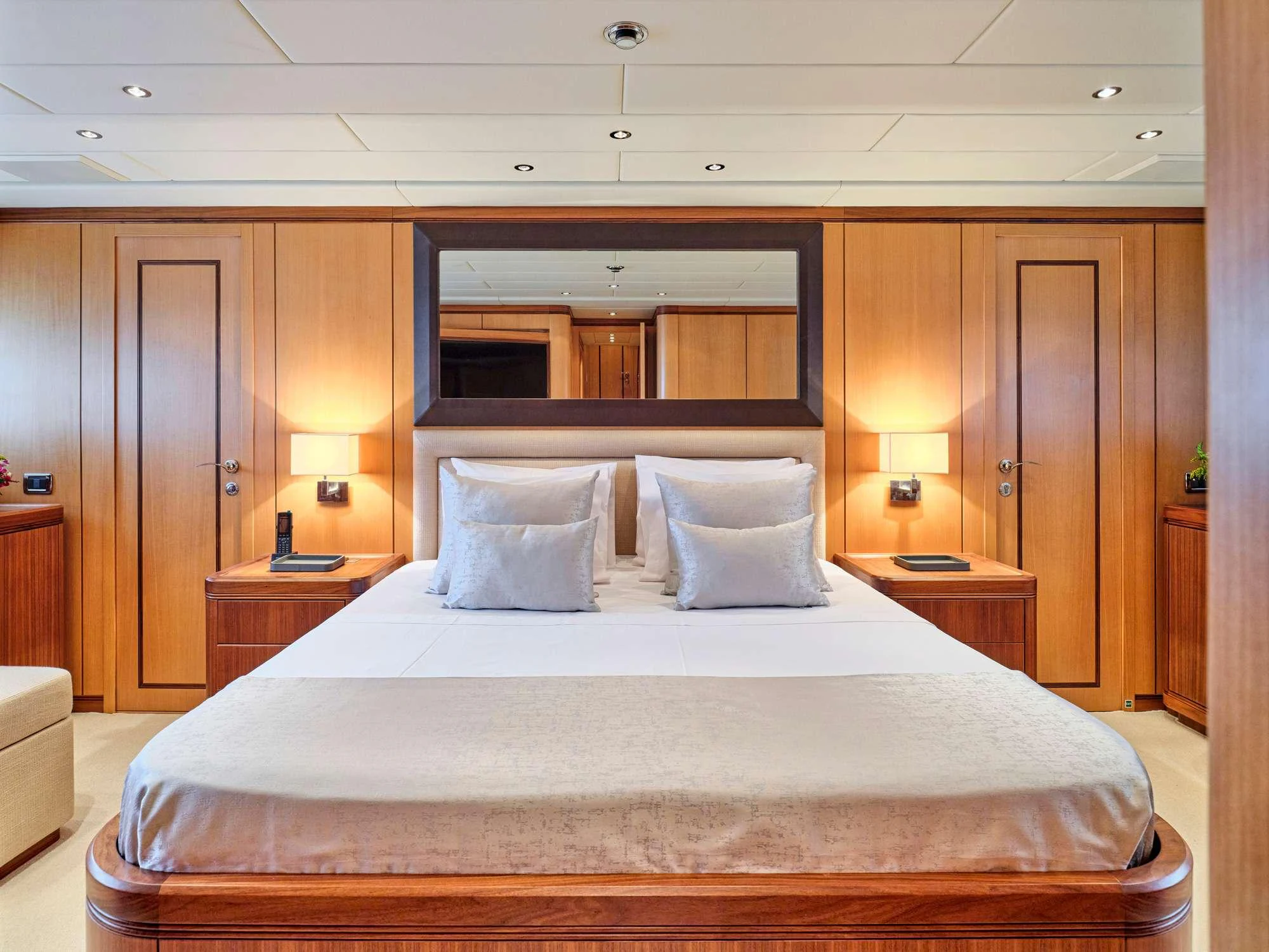 a large bed in a hotel room aboard WET PANTHER Yacht for Charter