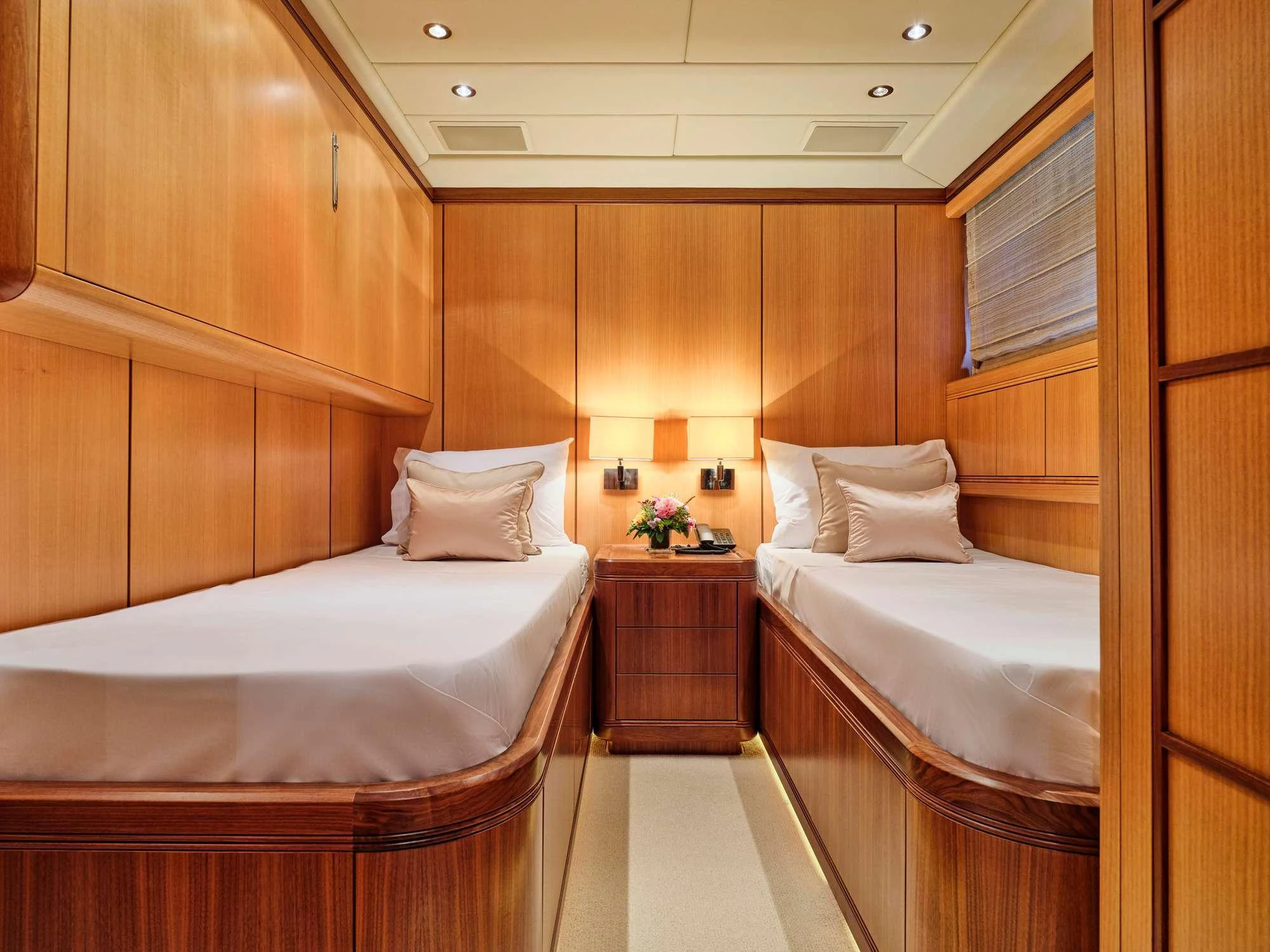 a room with wooden cabinets aboard WET PANTHER Yacht for Charter