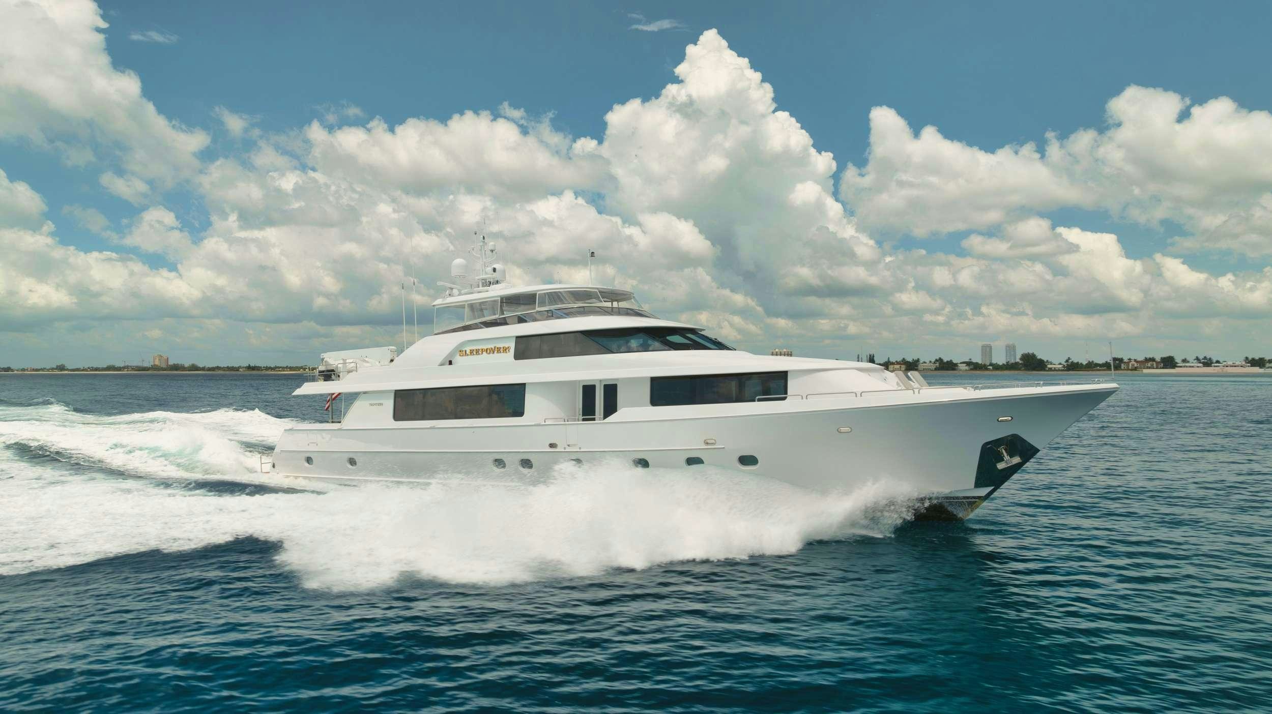 a white yacht on the water aboard SLEEPOVER Yacht for Charter