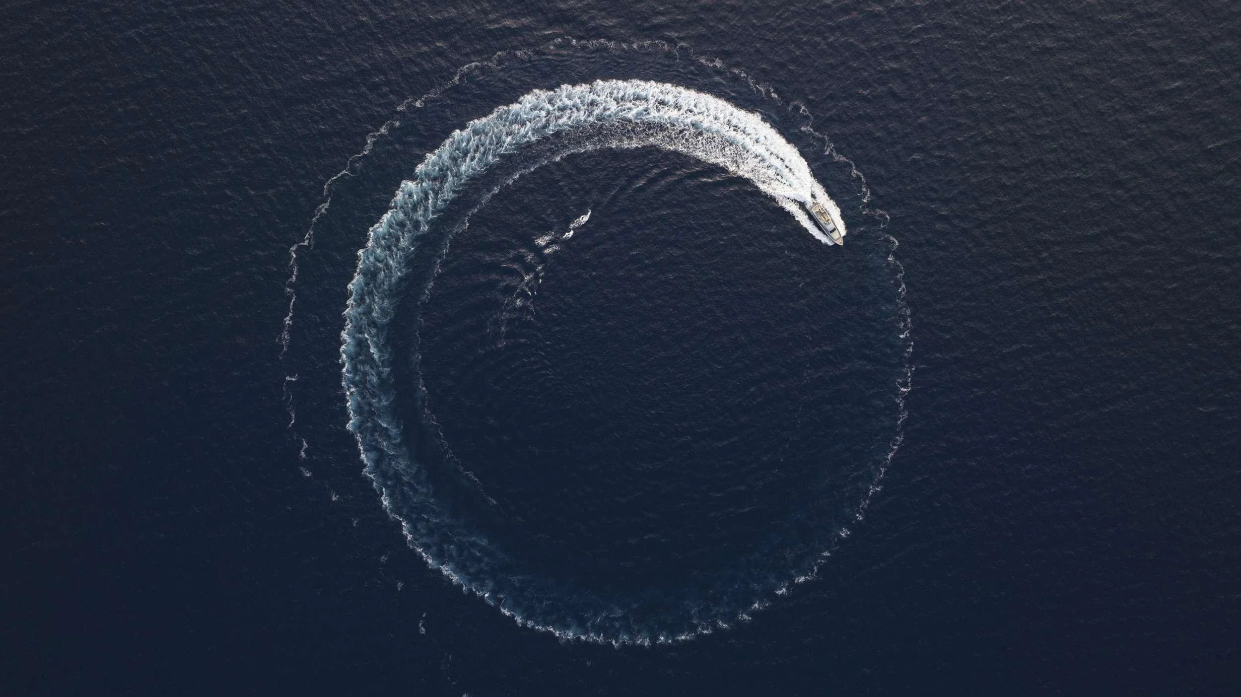 a planet in space aboard ANDROMEDA Yacht for Charter