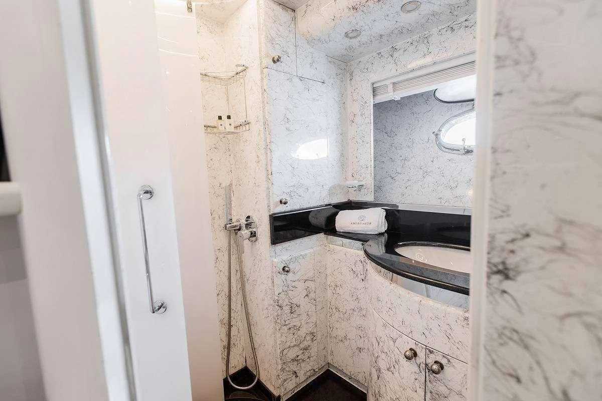 a dirty kitchen with a sink aboard ANDROMEDA Yacht for Charter