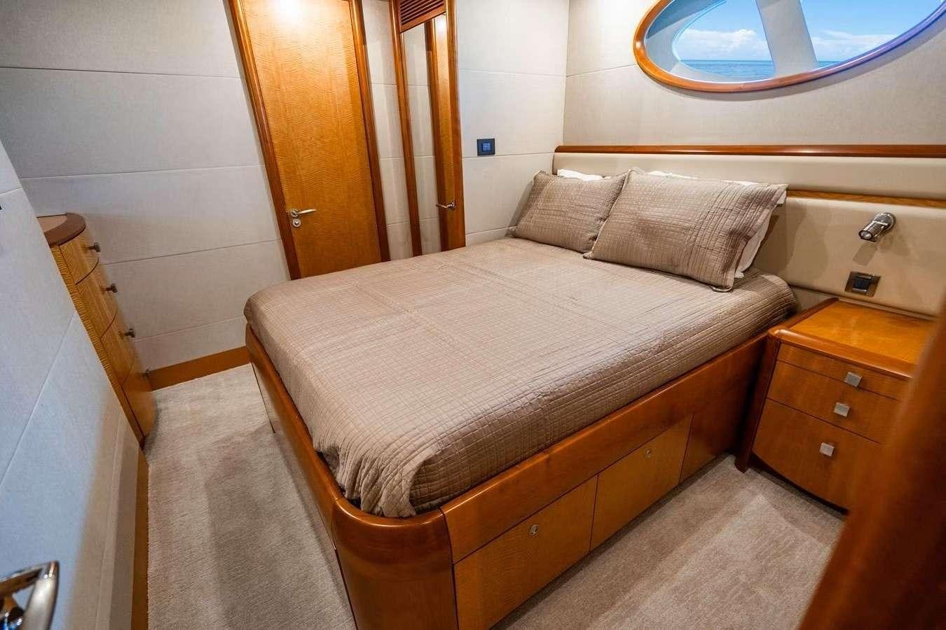 a bed in a room aboard VOYAGER Yacht for Charter