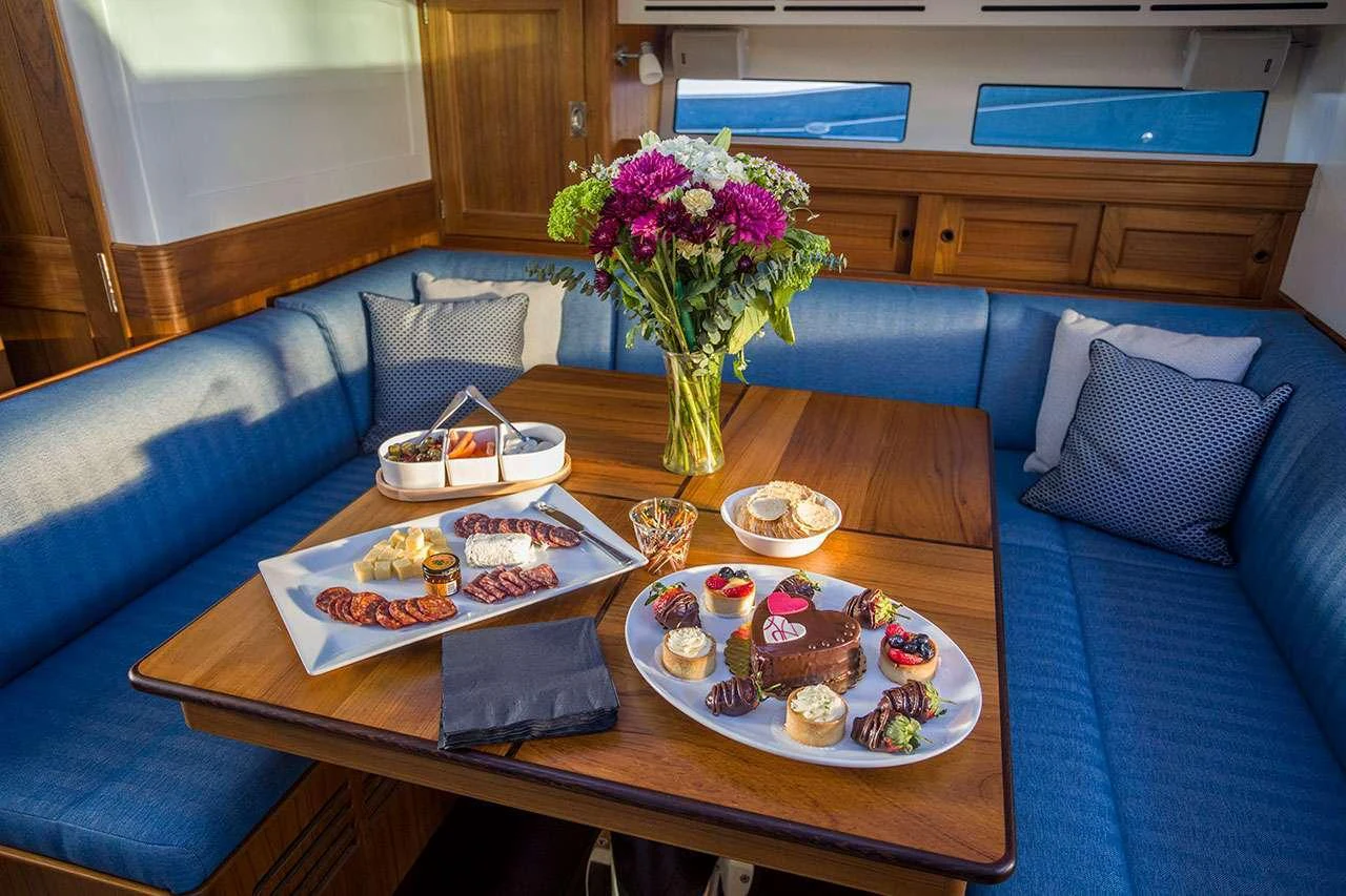 a table with food on it aboard CIRRUS Yacht for Charter