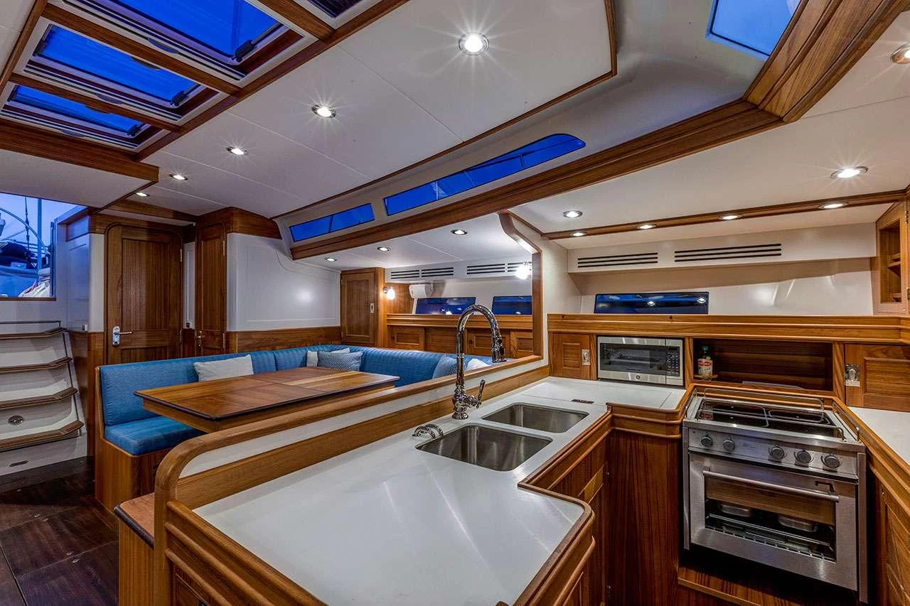 a large kitchen with a large jacuzzi tub aboard CIRRUS Yacht for Charter