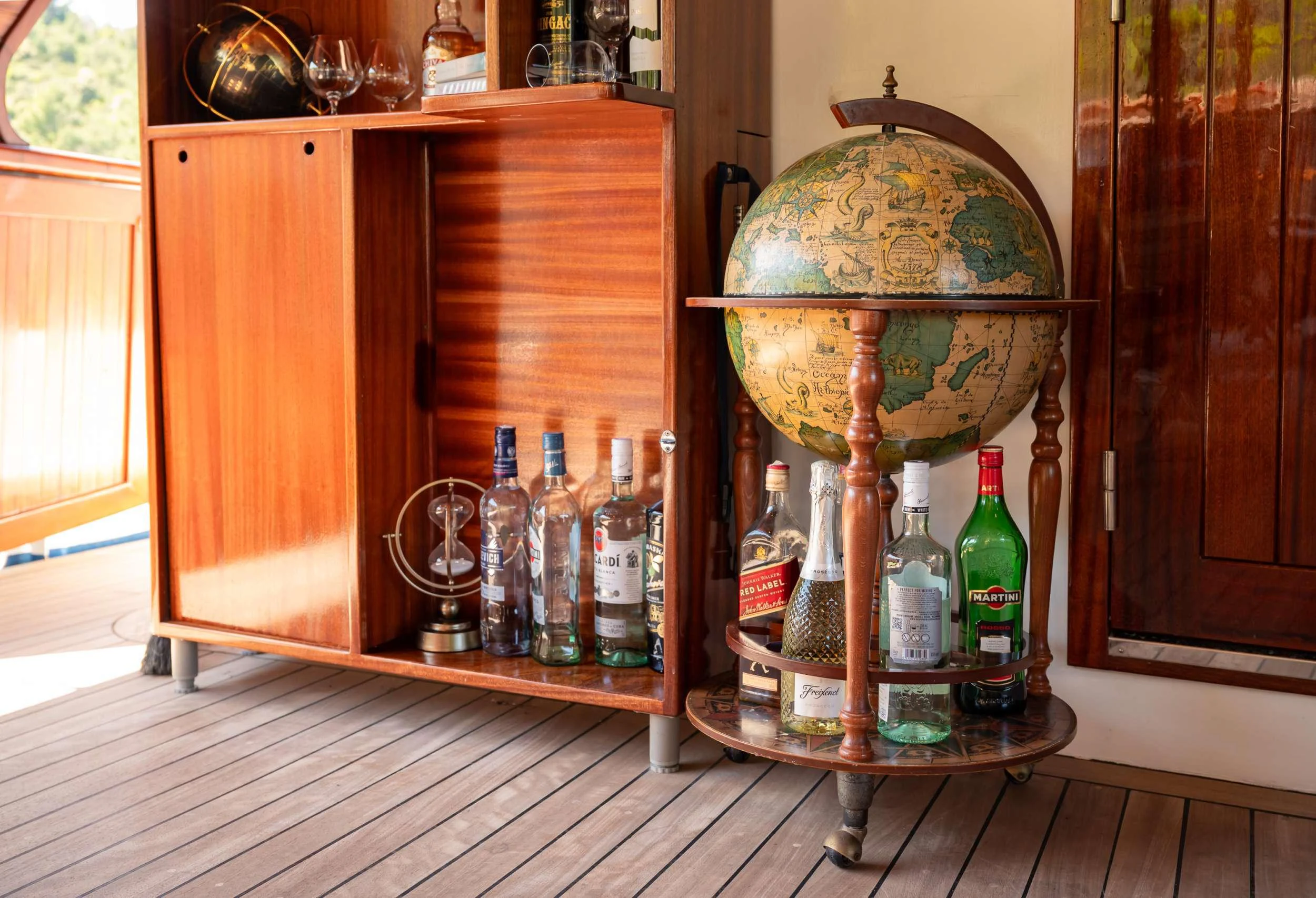 a glass globe on a table aboard MENDULA Yacht for Charter