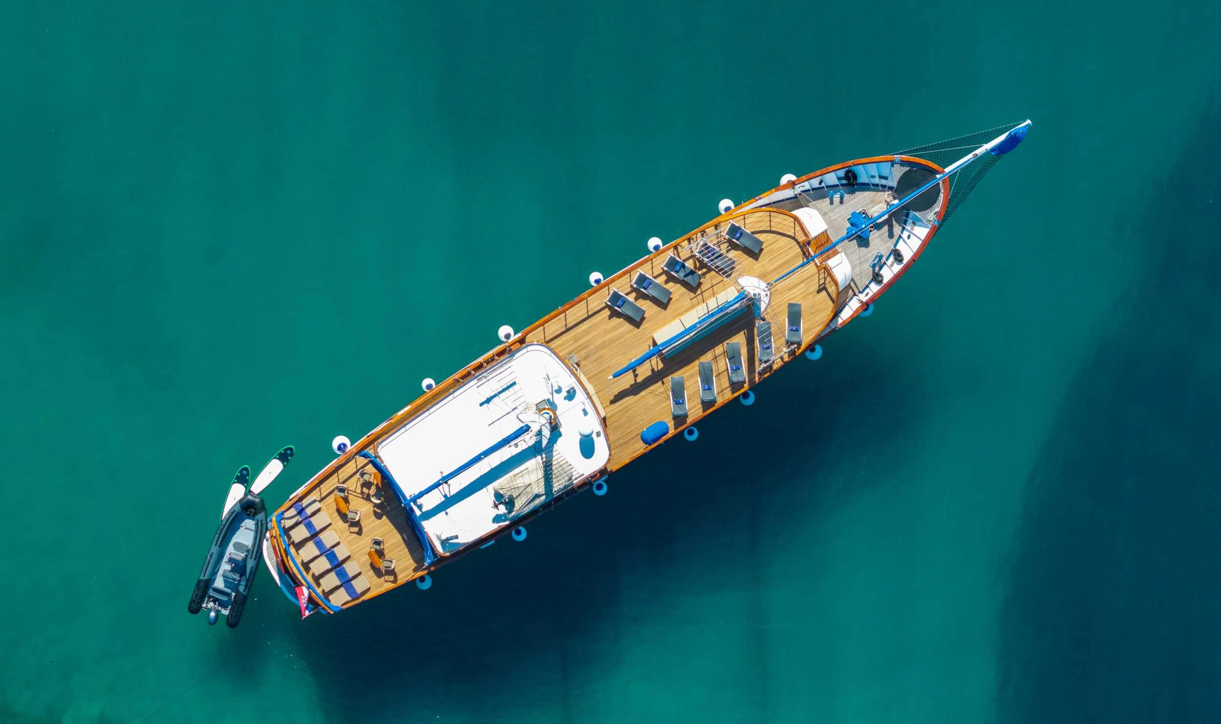 a close-up of a guitar aboard MENDULA Yacht for Charter