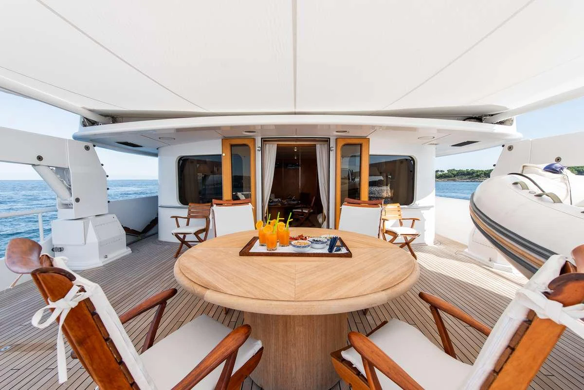 a dining table on a boat aboard SHEERGOLD Yacht for Charter