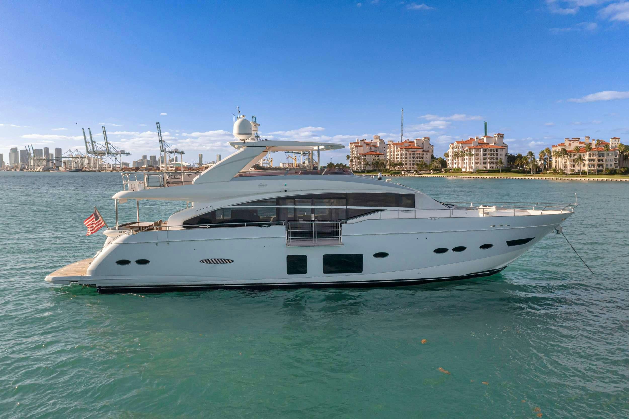 a white yacht in the water aboard FREEDOM Yacht for Charter