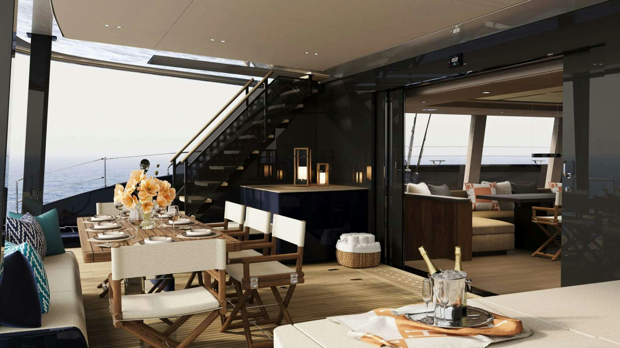 a room with tables and chairs aboard AHAVA Yacht for Charter