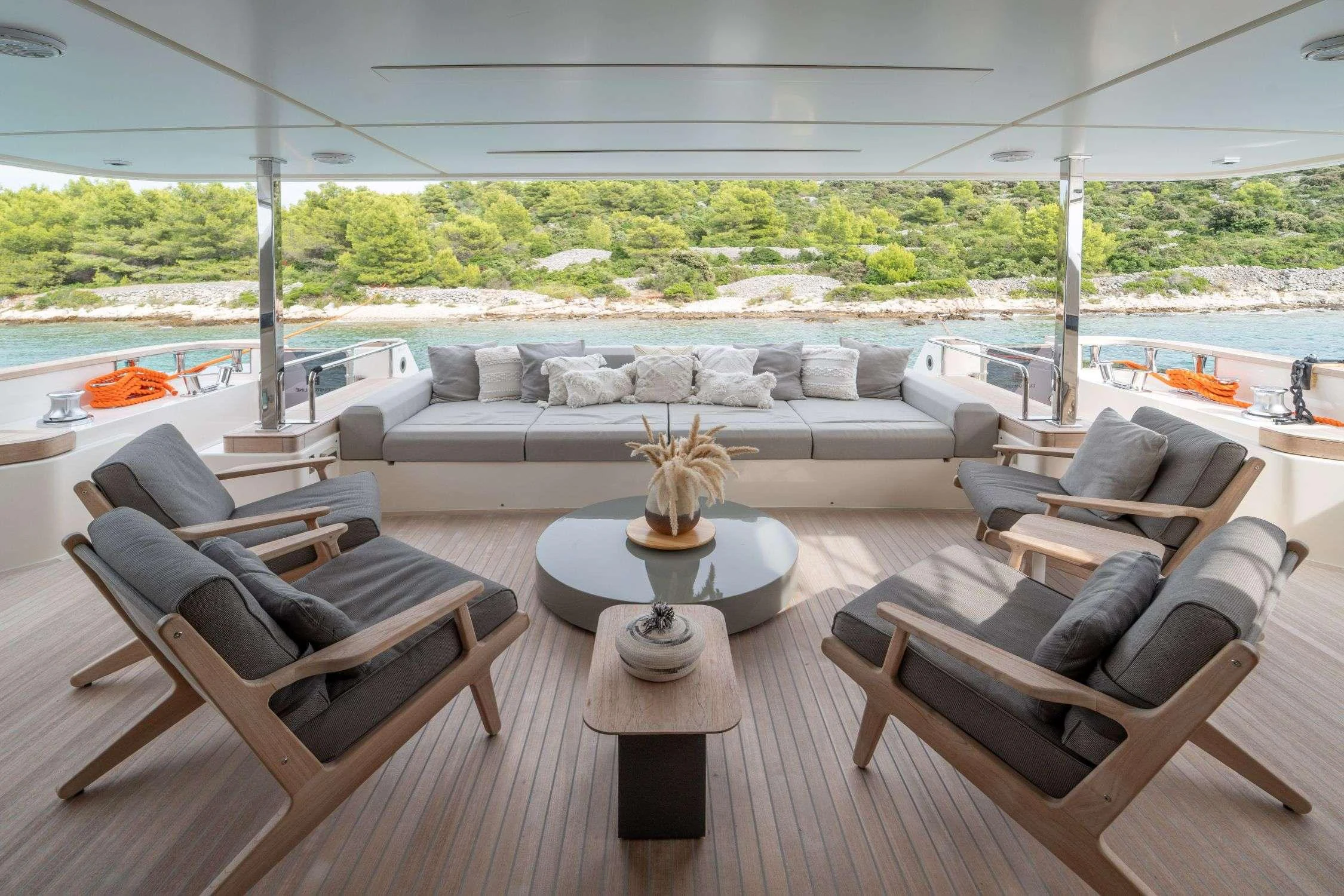 a living room with a large patio aboard SK Yacht for Charter