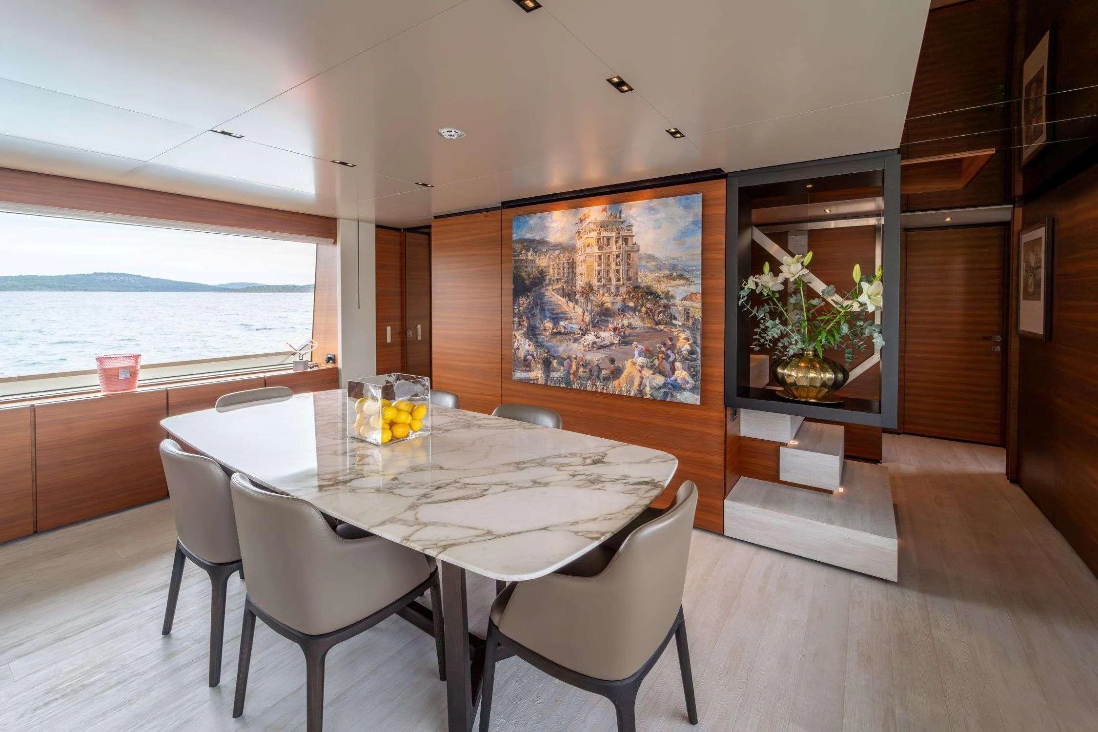 a table and chairs in a room aboard SK Yacht for Charter