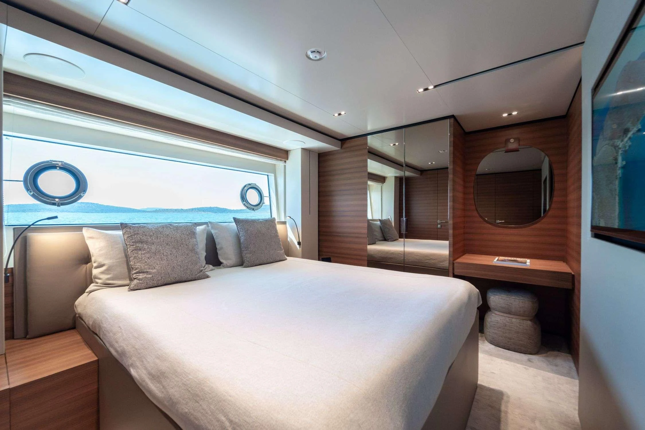 a bed in a room aboard SK Yacht for Charter