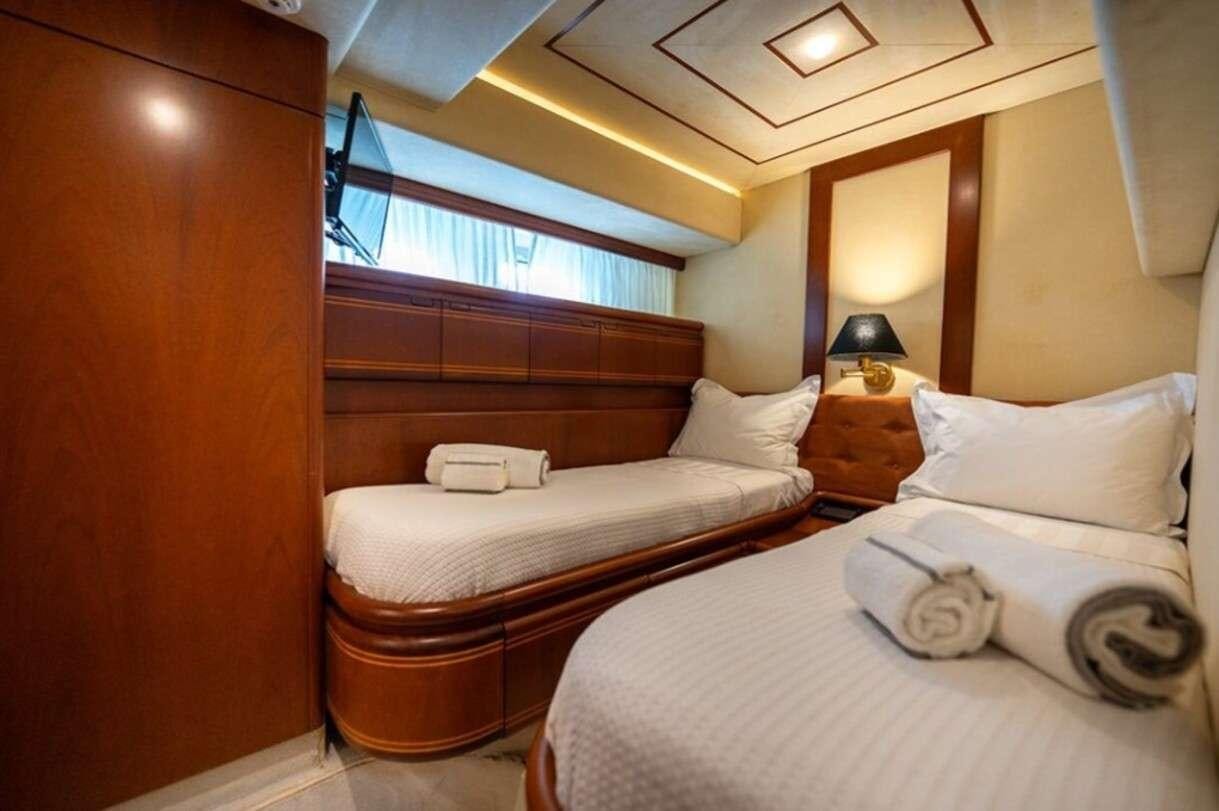a room with two beds aboard BELLAS BOY Yacht for Charter
