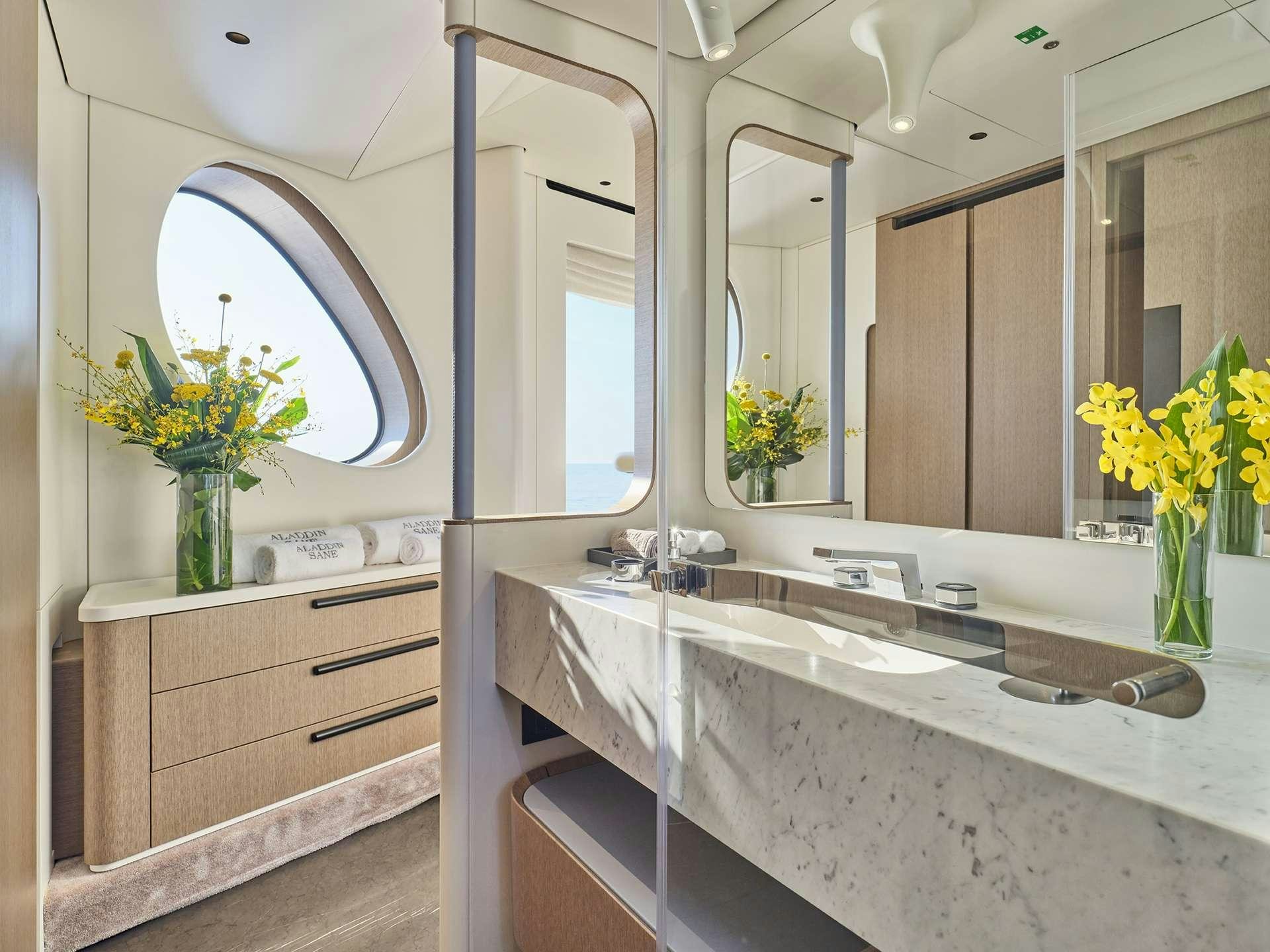 a bathroom with a large marble countertop aboard ALADDIN SANE Yacht for Charter