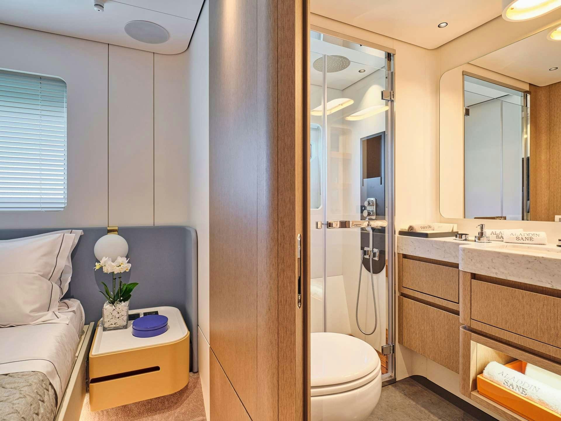 a bathroom with a shower and a sink aboard ALADDIN SANE Yacht for Charter