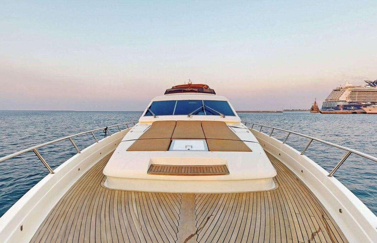 a boat on a body of water aboard STRESS NEGATIVE Yacht for Charter