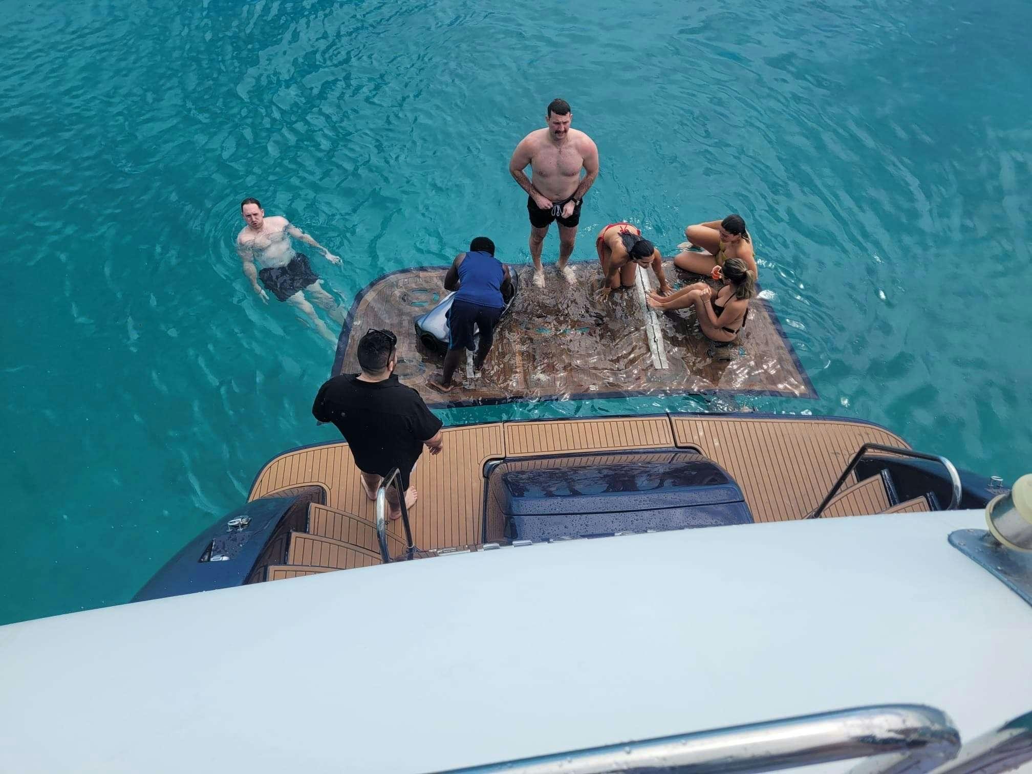 a group of people on a boat aboard SAPHIRE BLUE Yacht for Charter