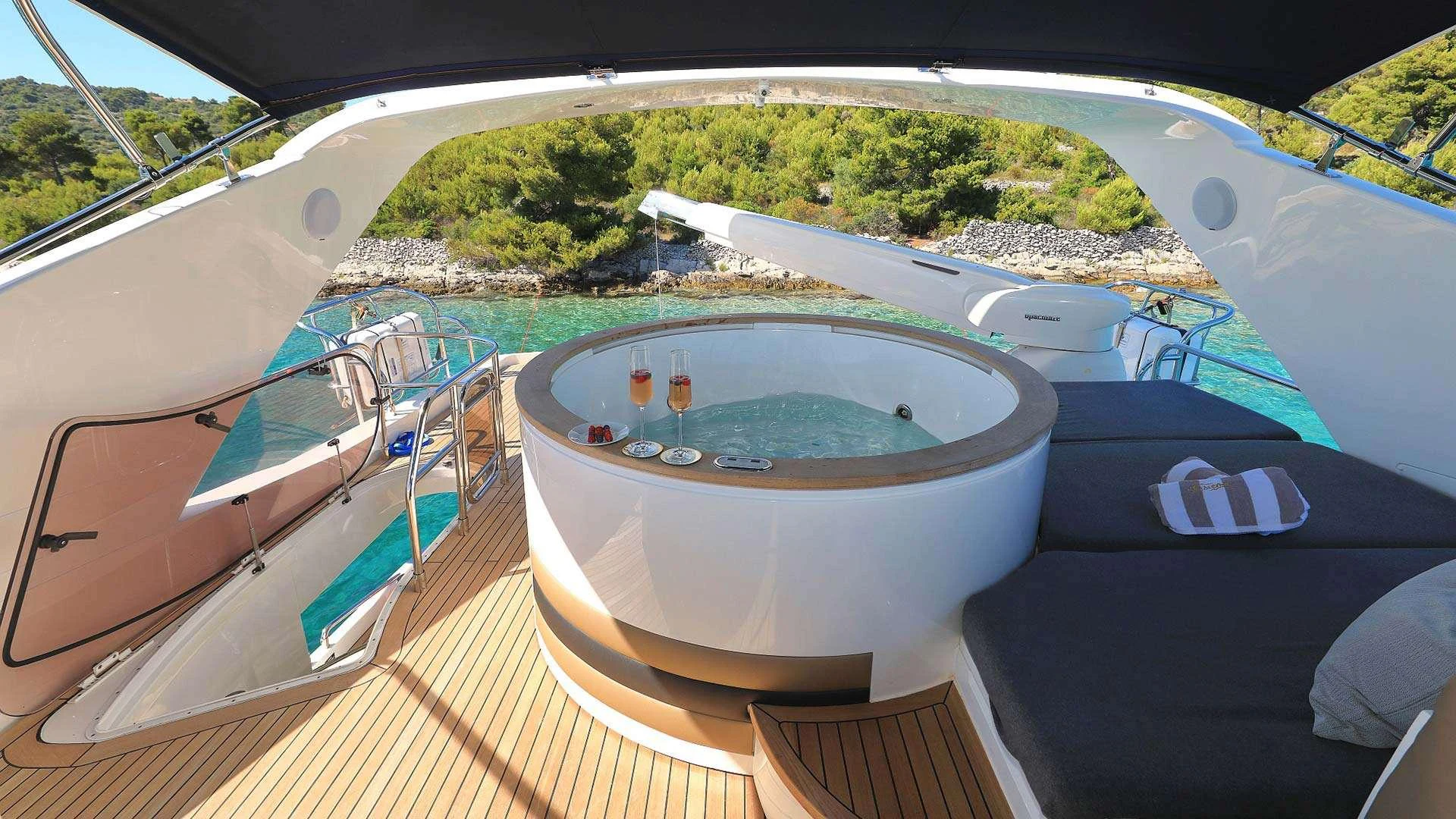 a pool on a deck aboard INSIEME Yacht for Charter