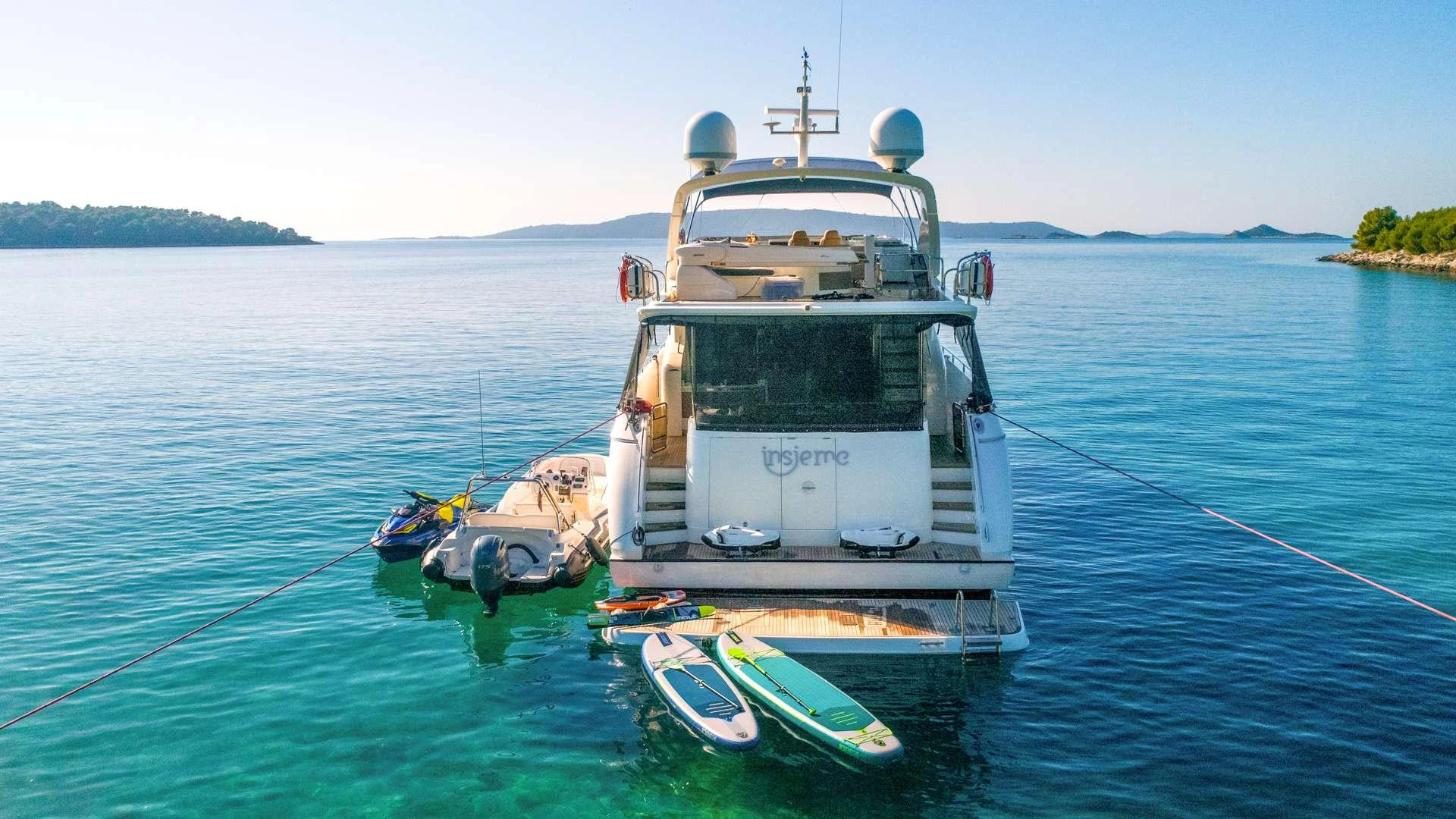 a boat on the water aboard INSIEME Yacht for Charter