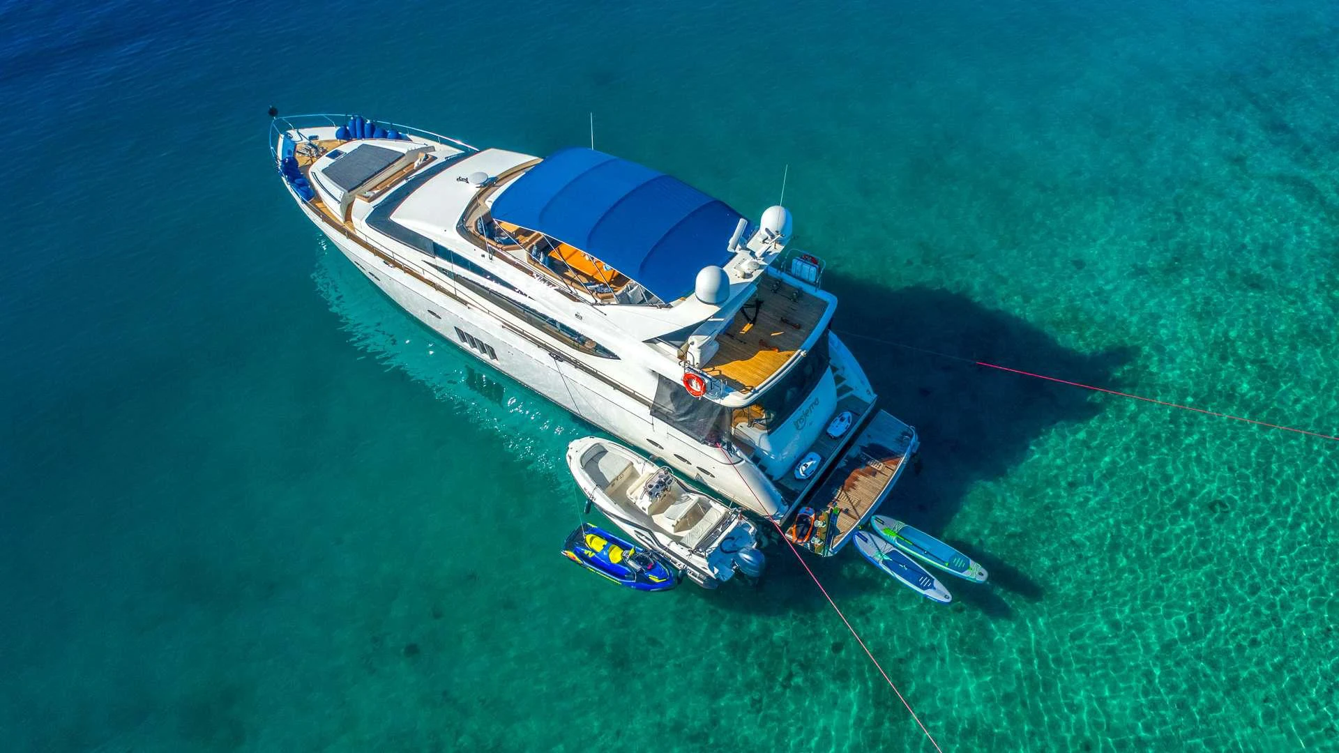 a boat on the water aboard INSIEME Yacht for Charter