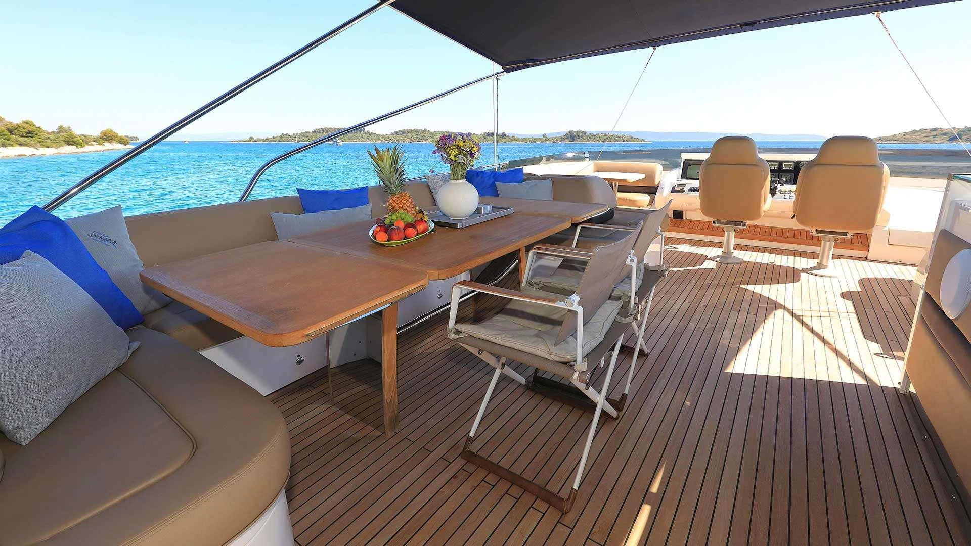 a table on a deck aboard INSIEME Yacht for Charter