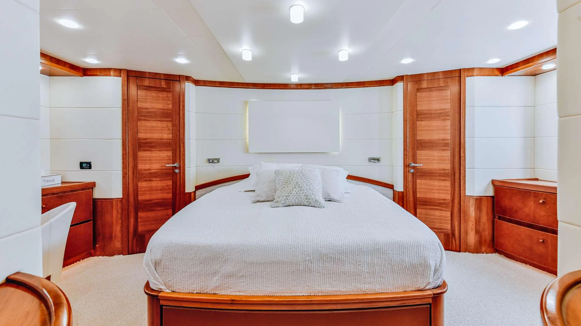 a large bedroom with a bed aboard CAMY Yacht for Charter